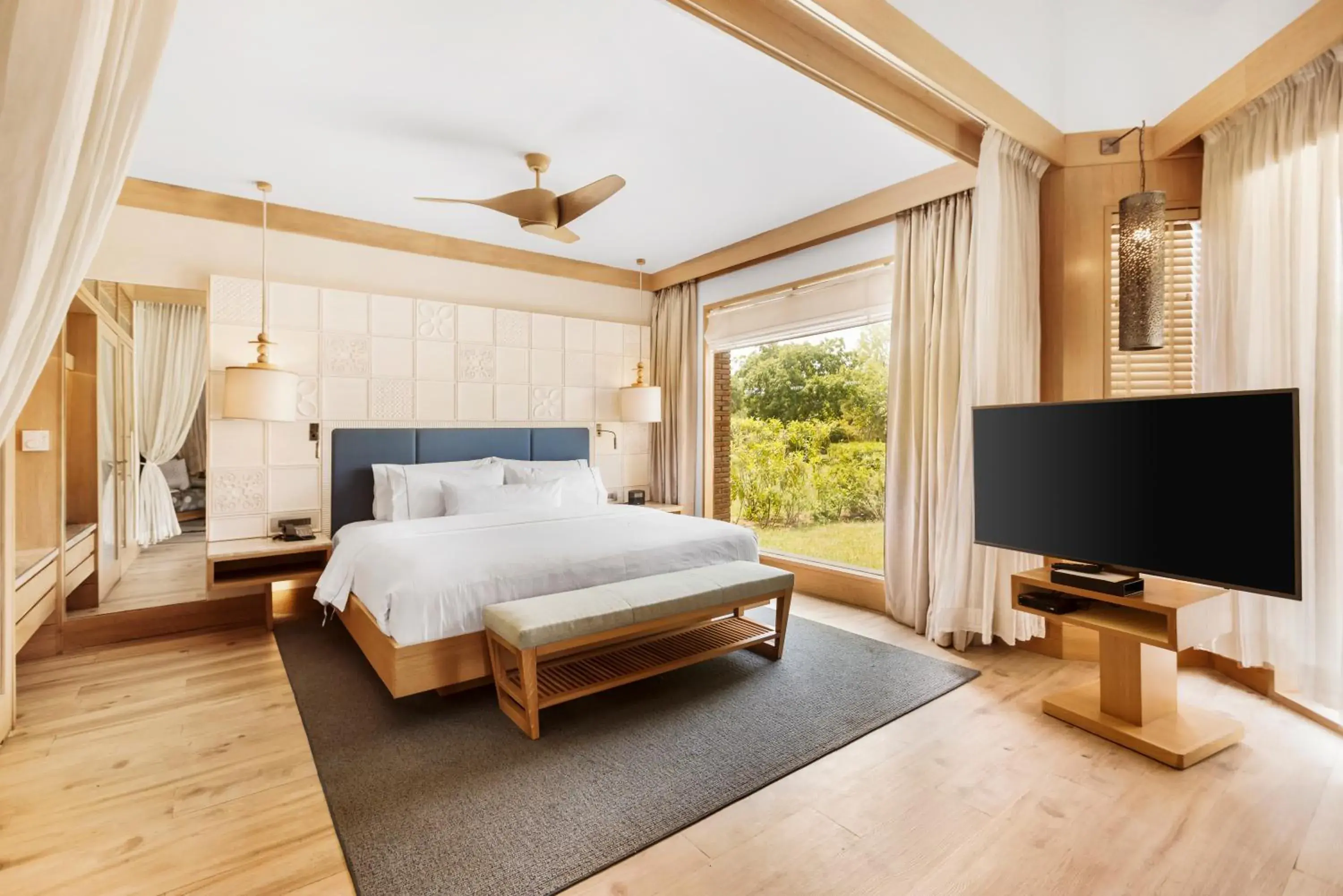 Bed in The Westin Sohna Resort & Spa
