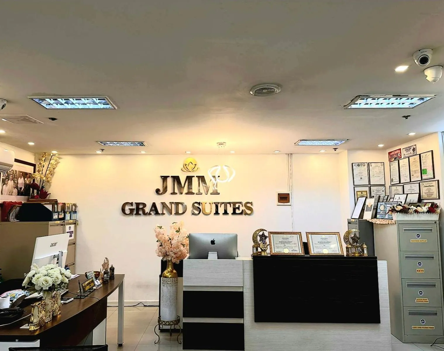 Property logo or sign in JMM Grand Suites
