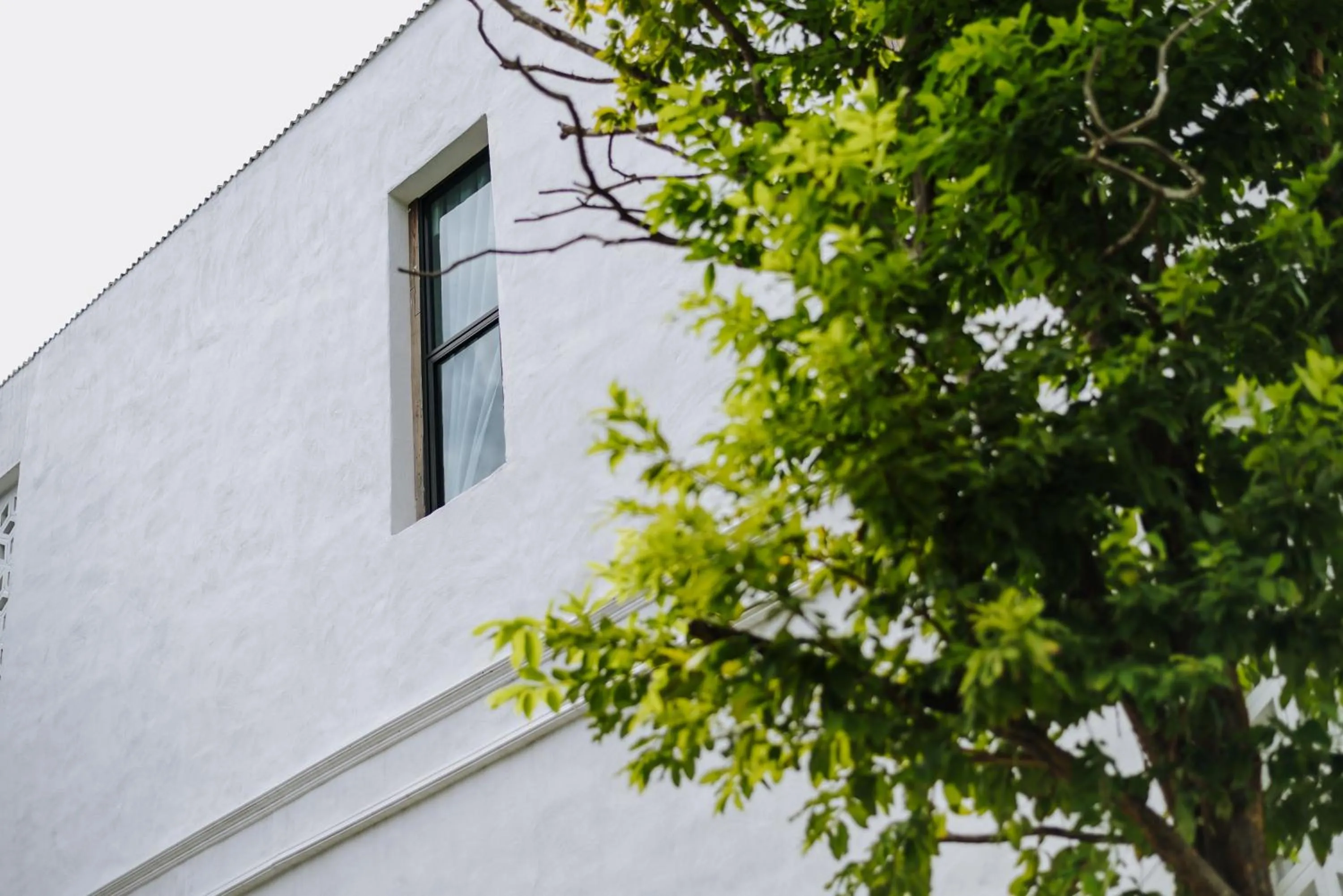 Property building in White Wall Riverfront Hotel
