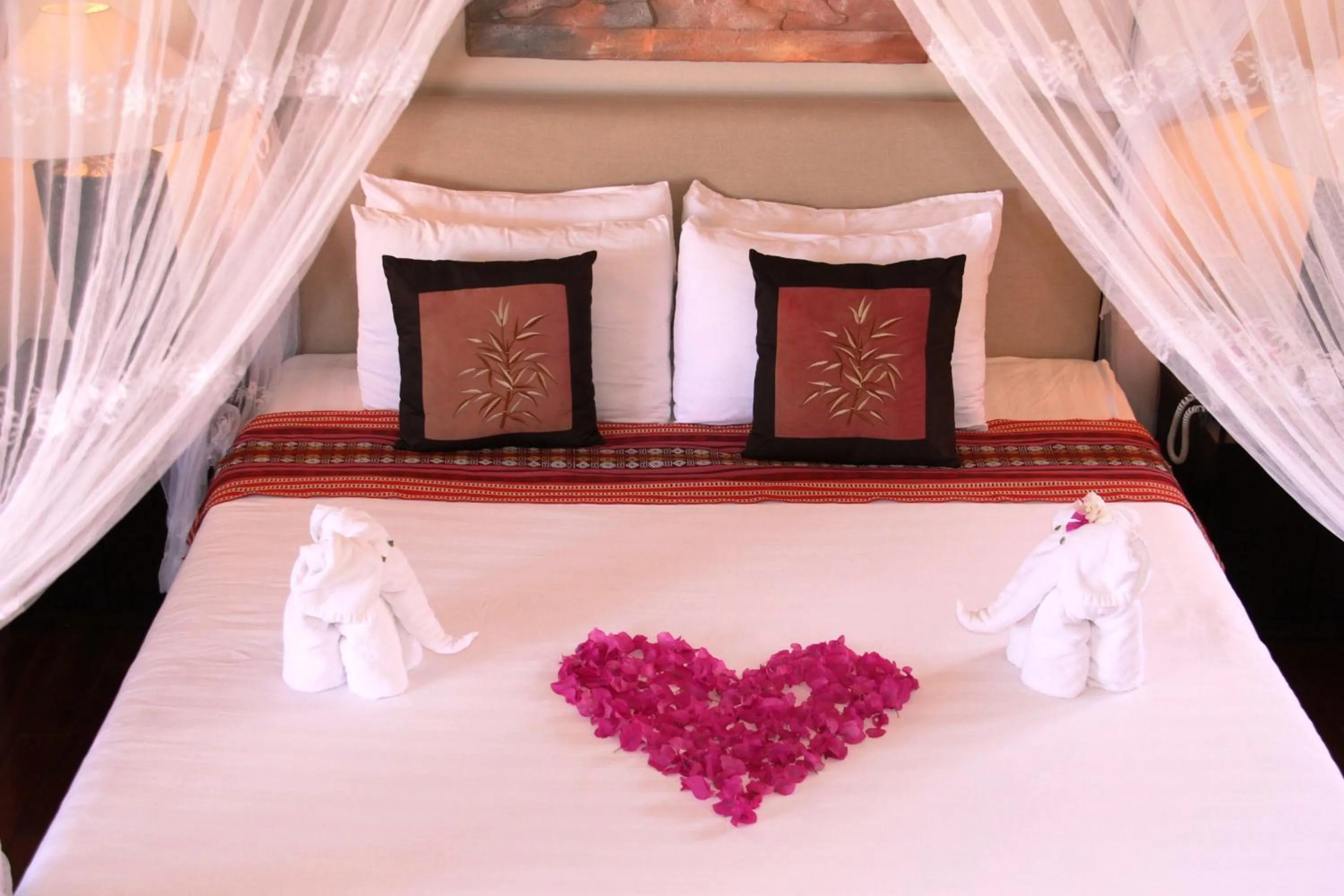 Bed in Poshanu Boutique Resort