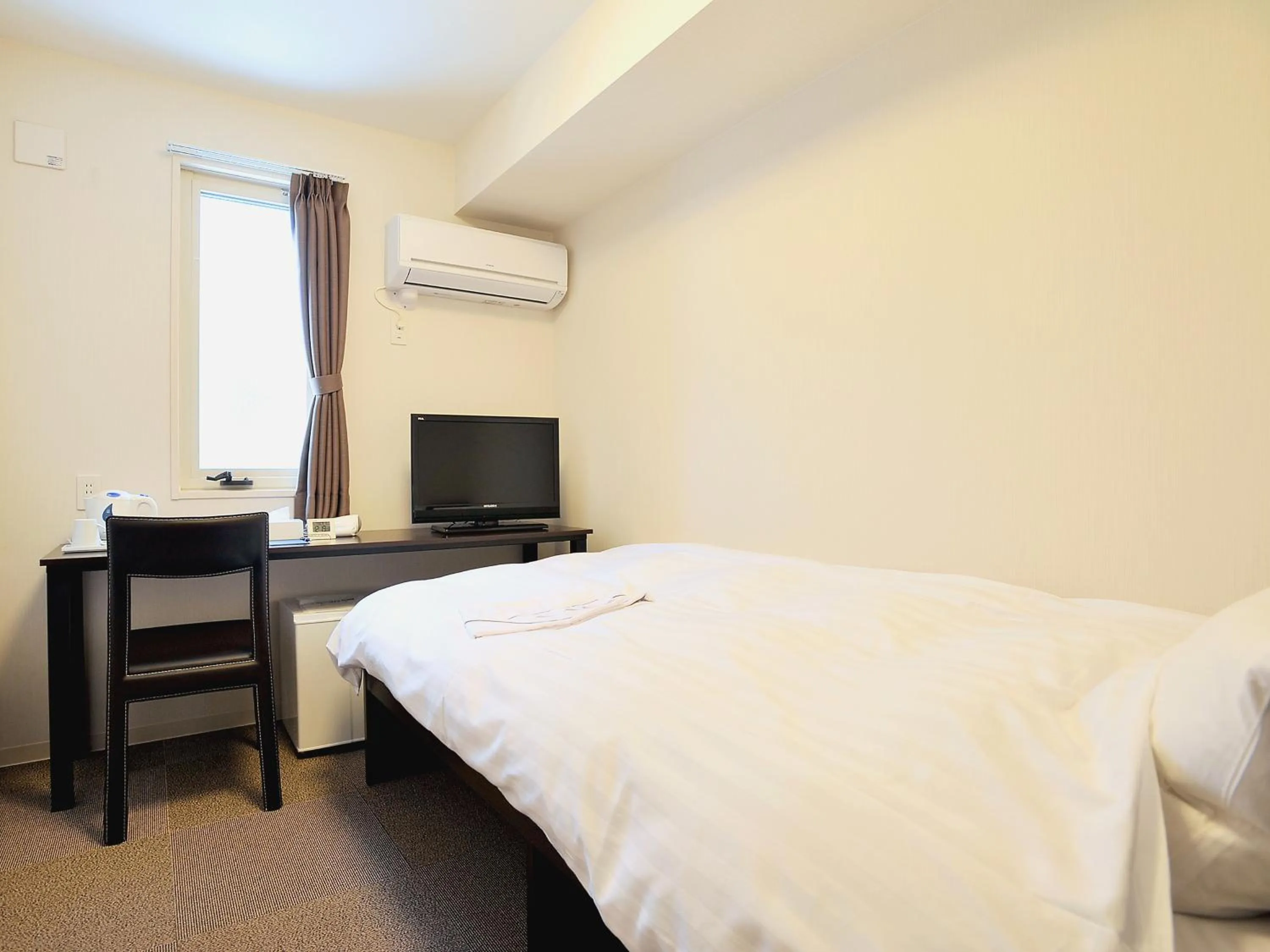 Photo of the whole room, Bed in Value the Hotel Ishinomaki