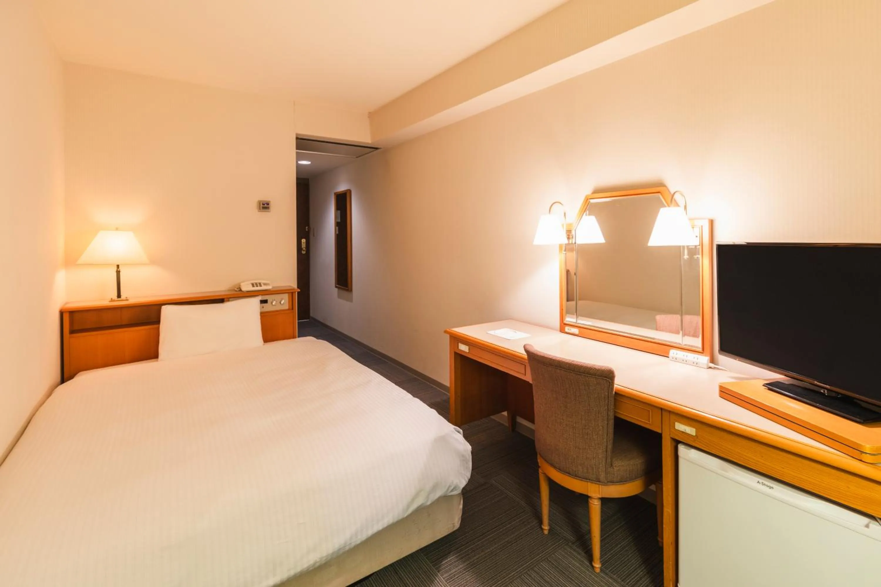 Photo of the whole room, Bed in Hotel Sunroute Niigata