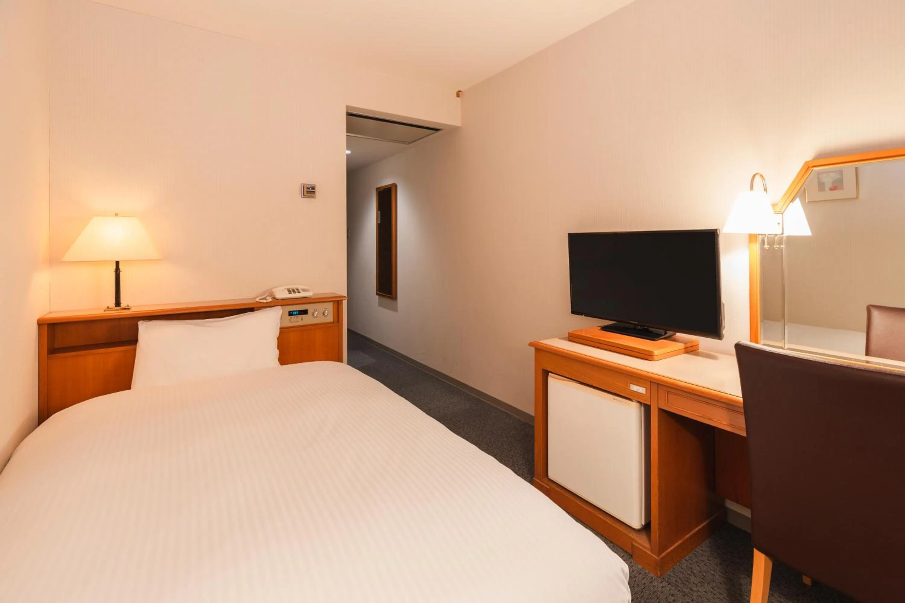 Photo of the whole room, Bed in Hotel Sunroute Niigata