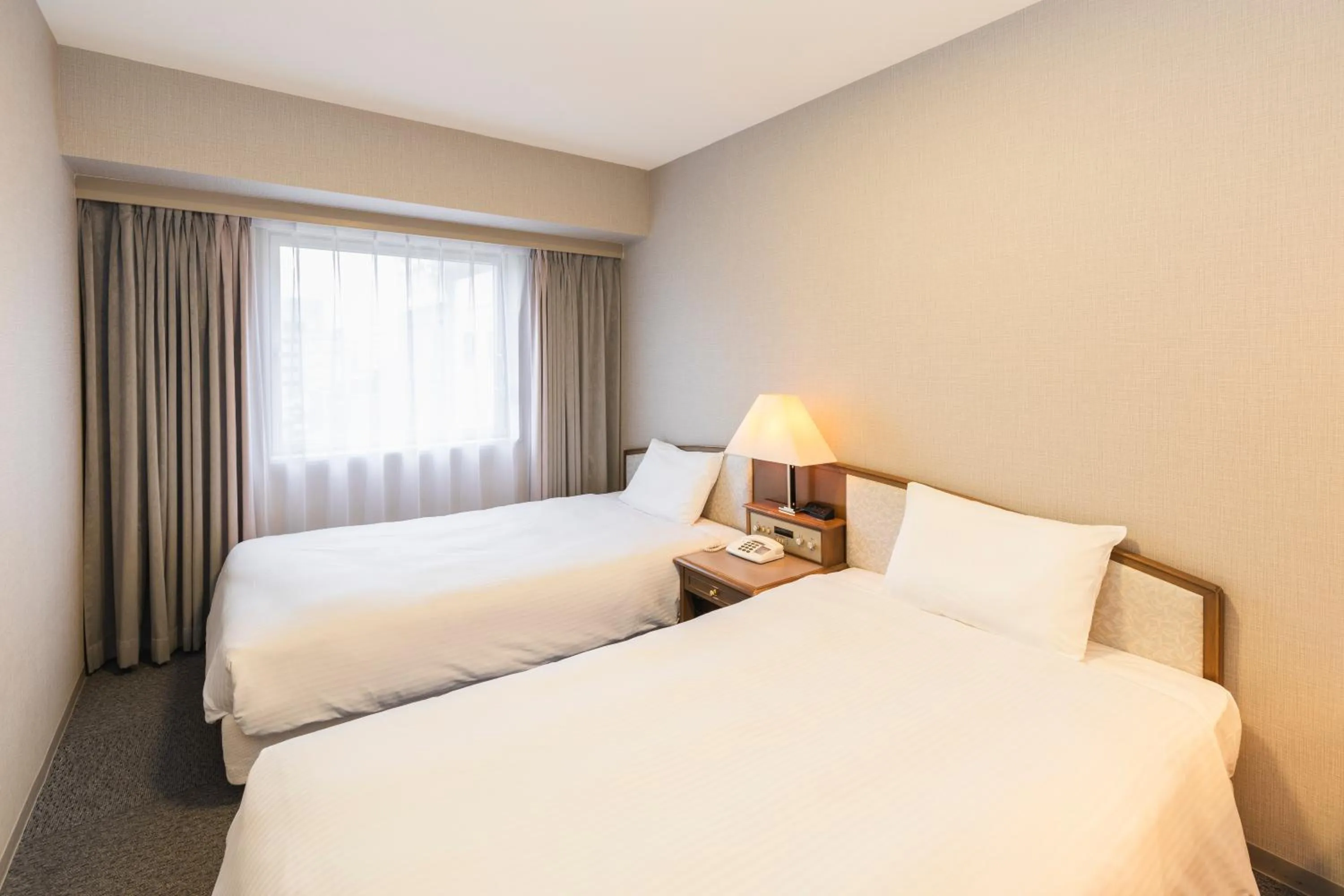 Photo of the whole room, Bed in Hotel Sunroute Niigata