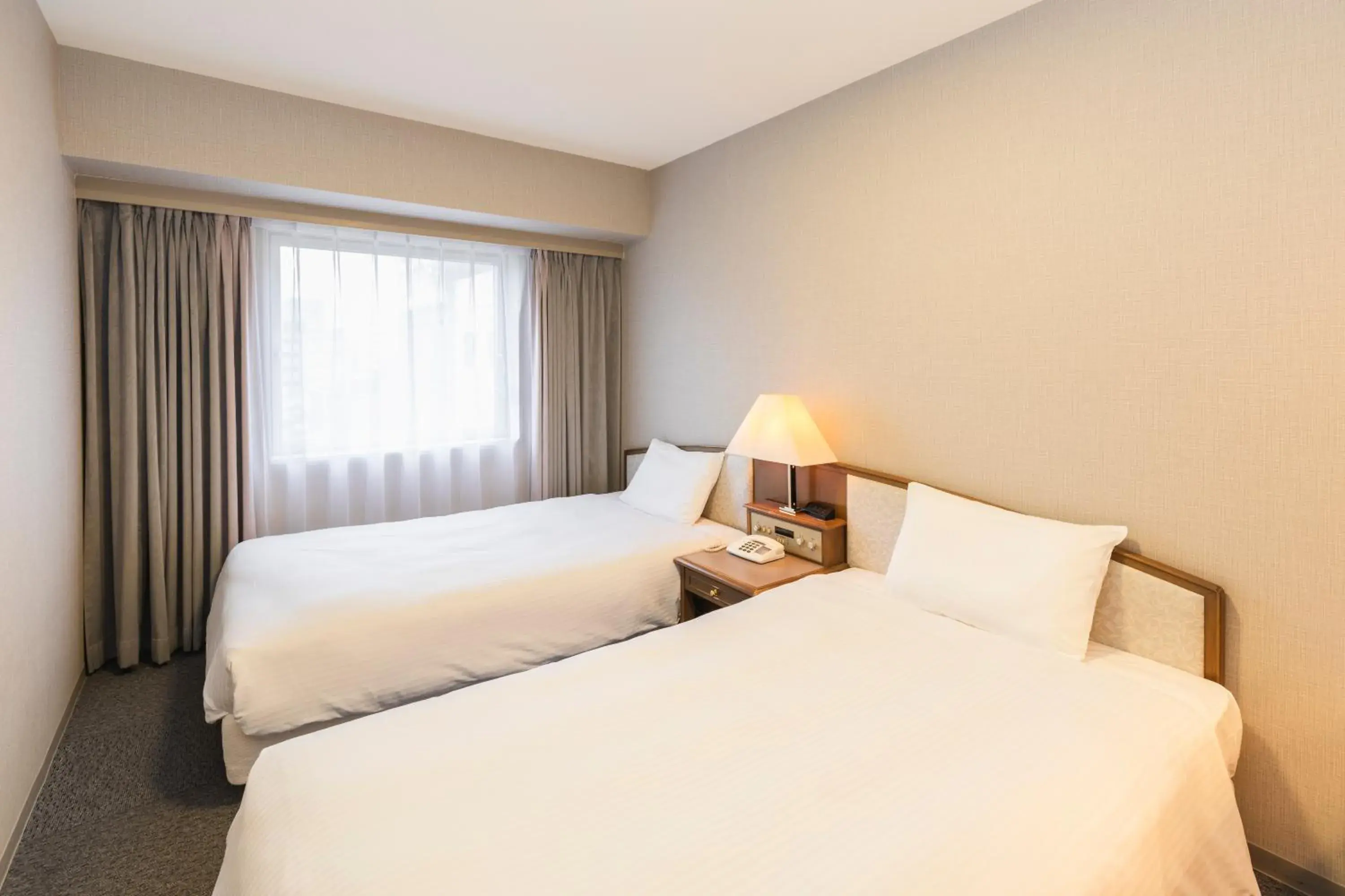 Economy Twin Room - Non-Smoking in Hotel Sunroute Niigata Economy Twin Room - Non-Smoking in Hotel Sunroute Niigata