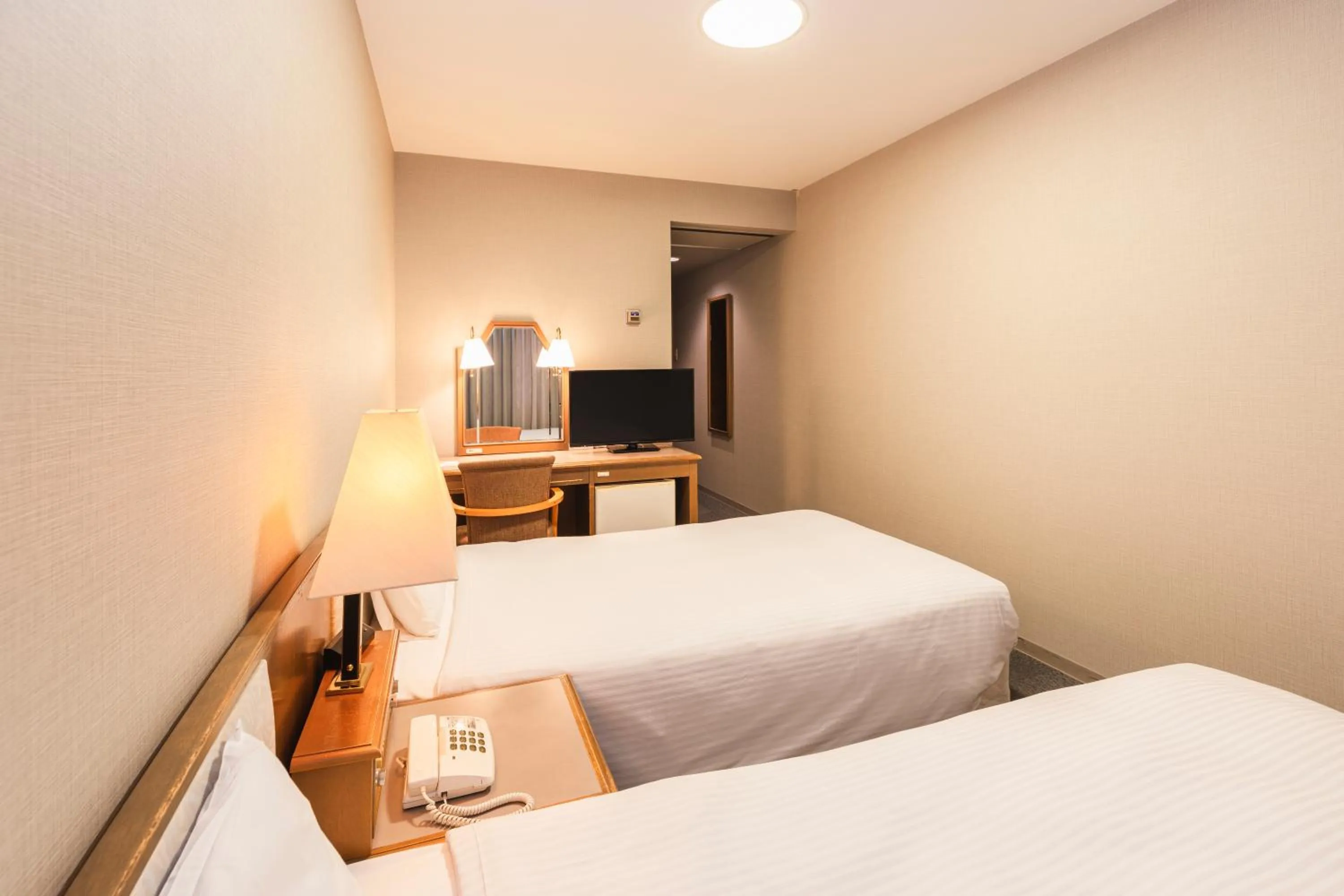 Photo of the whole room, Bed in Hotel Sunroute Niigata