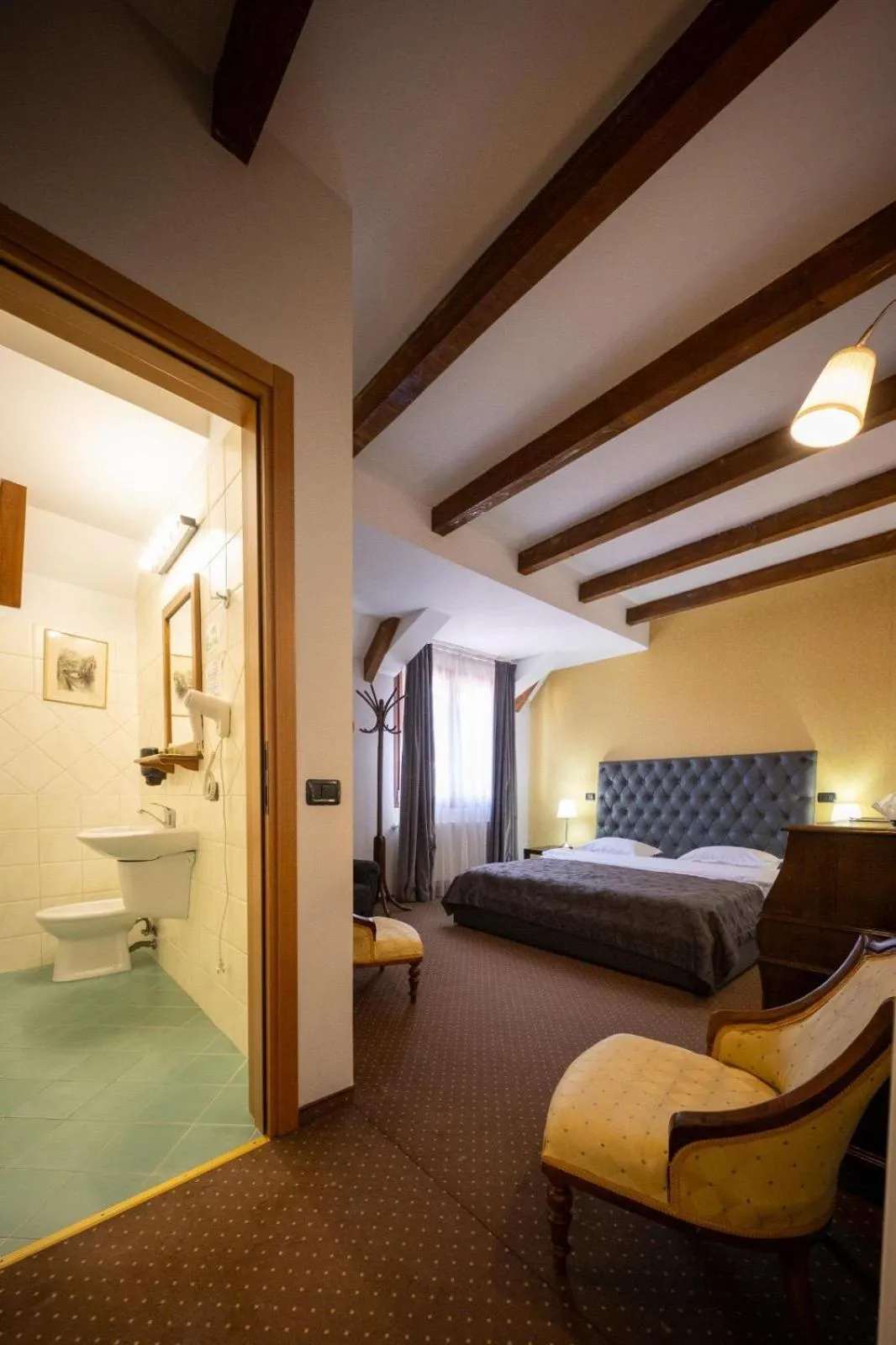 Bed in Pensiunea Restaurant Al Gallo