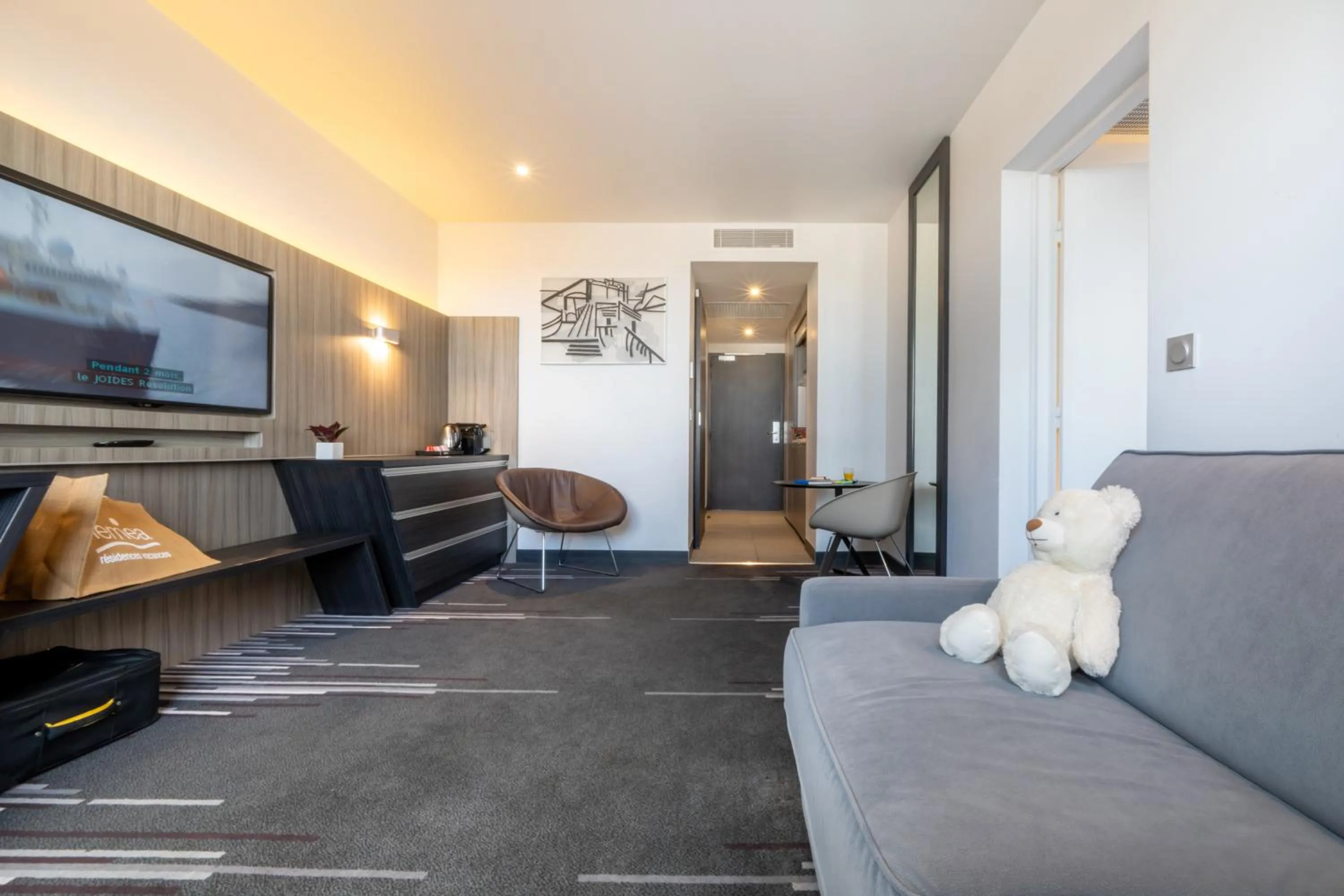 Seating area in Nemea Appart Hotel Concorde Toulouse Gare Matabiau