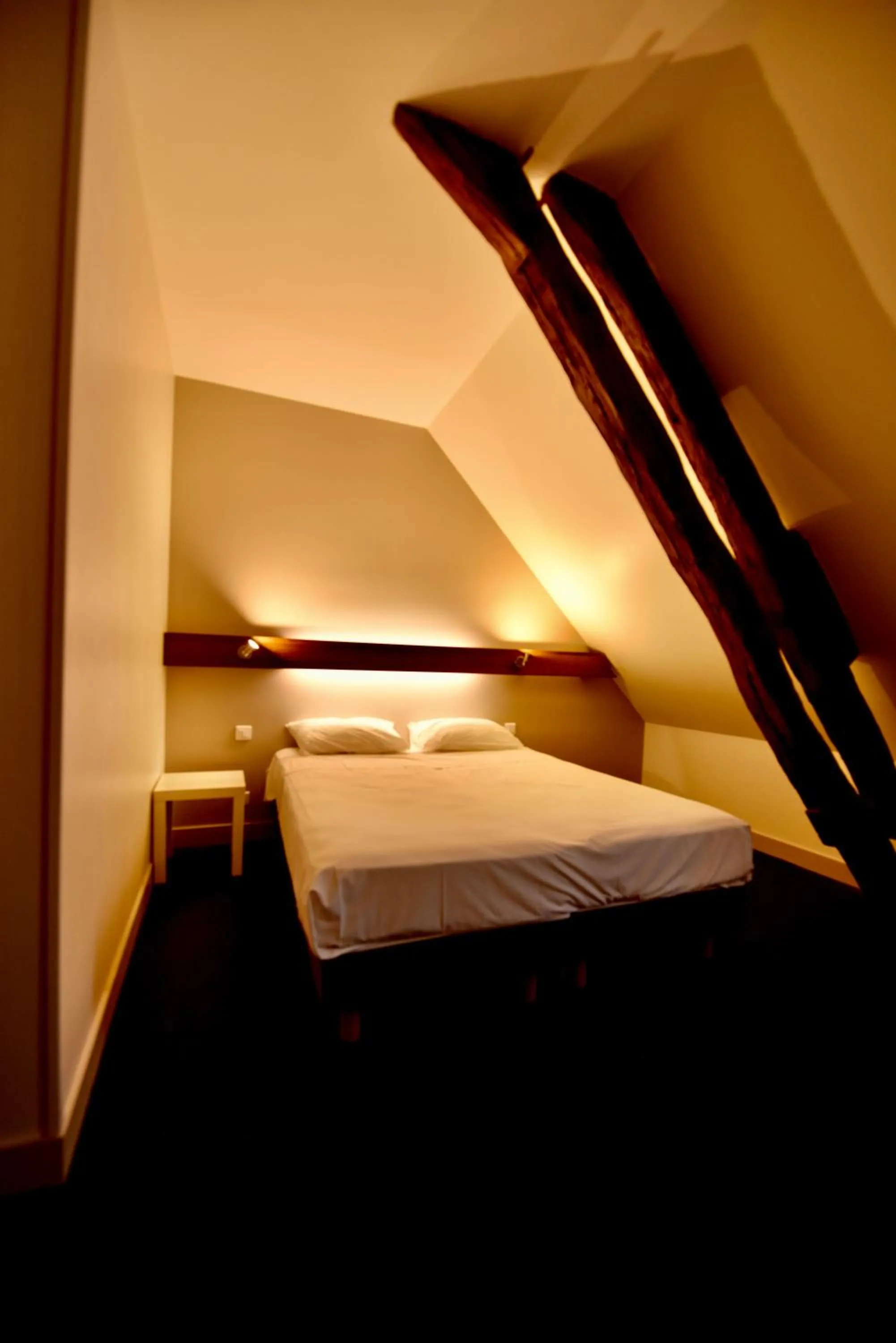 Bed in Le Relais du Château