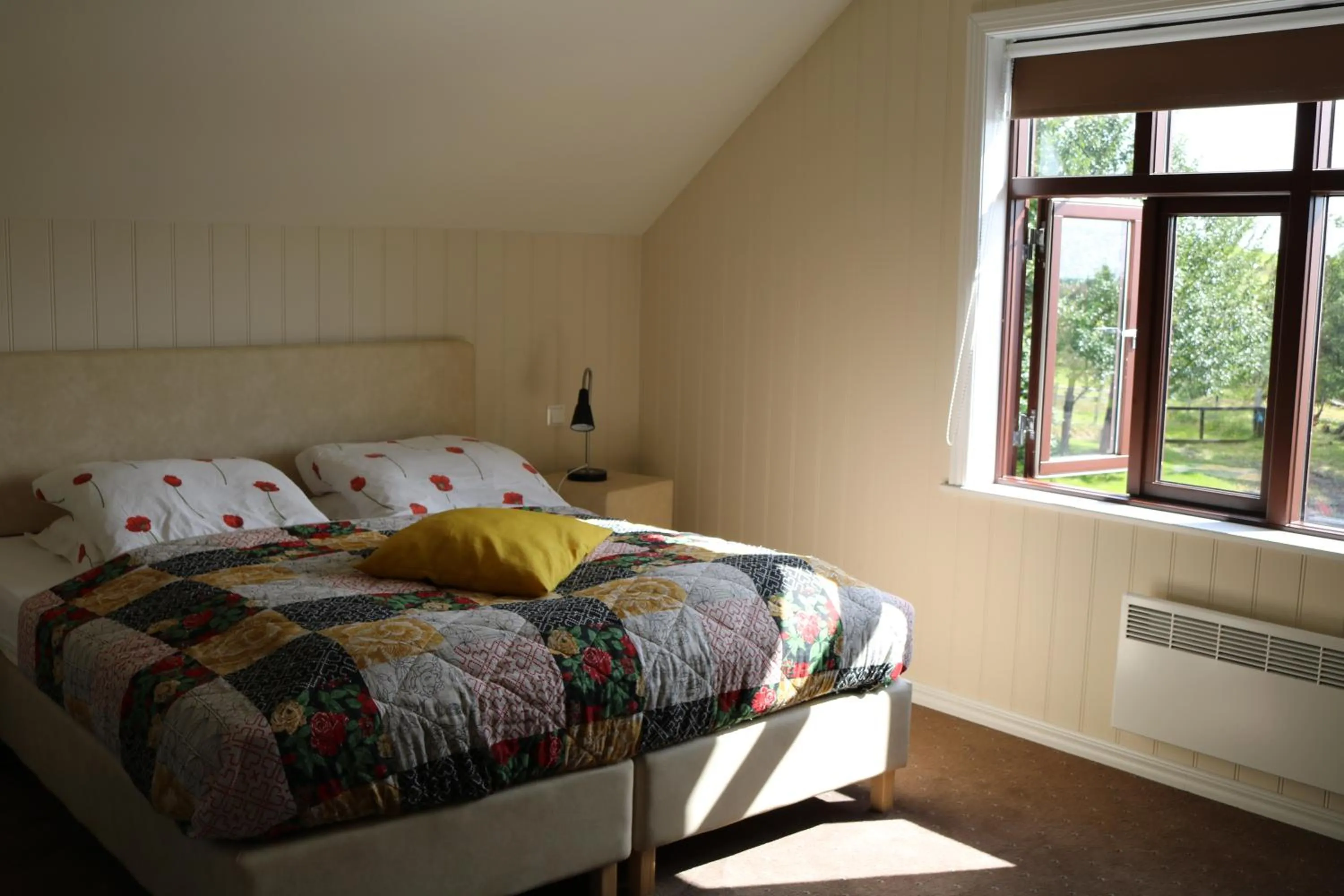 Bed in Sólheimahjáleiga Guesthouse