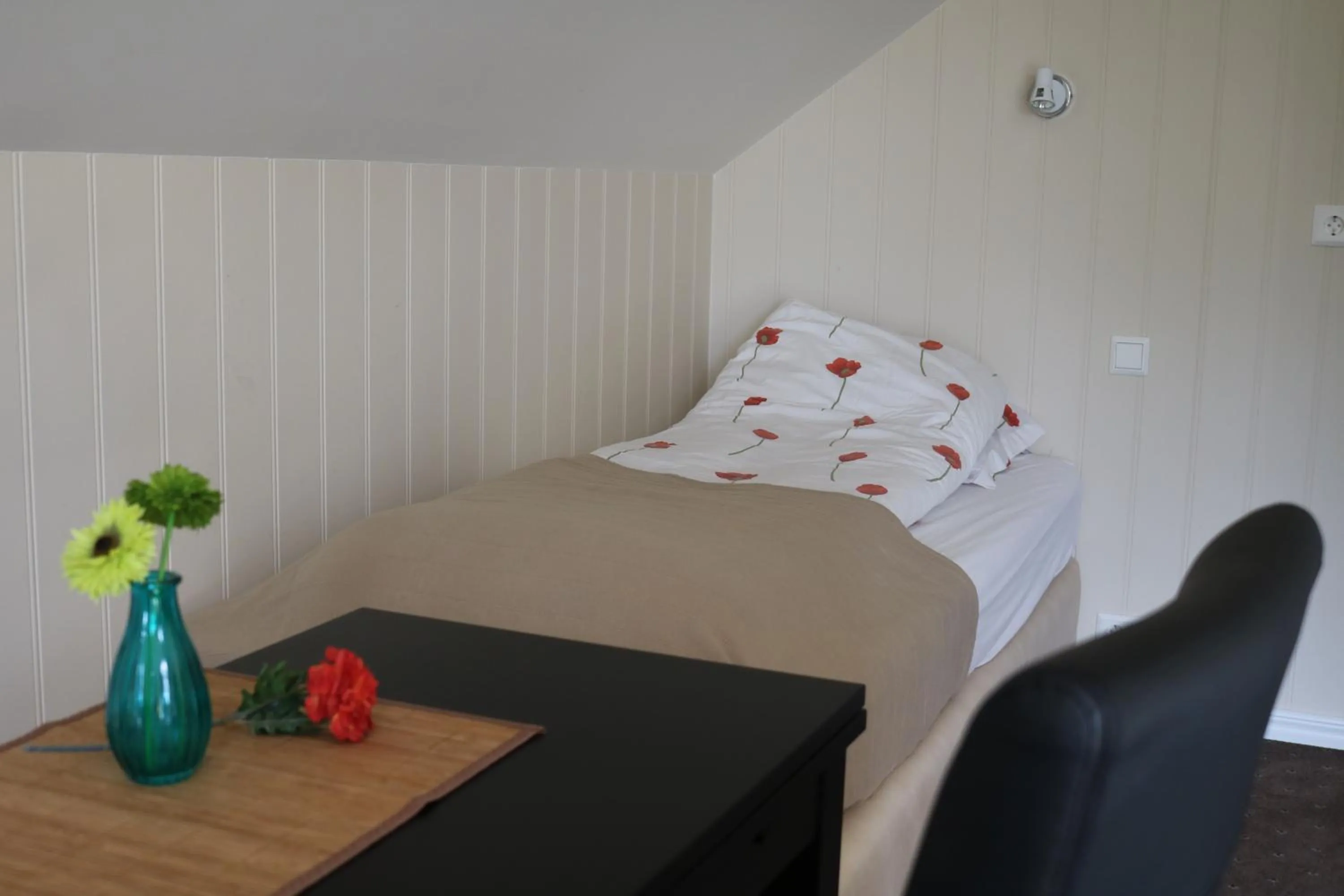 Bed in Sólheimahjáleiga Guesthouse