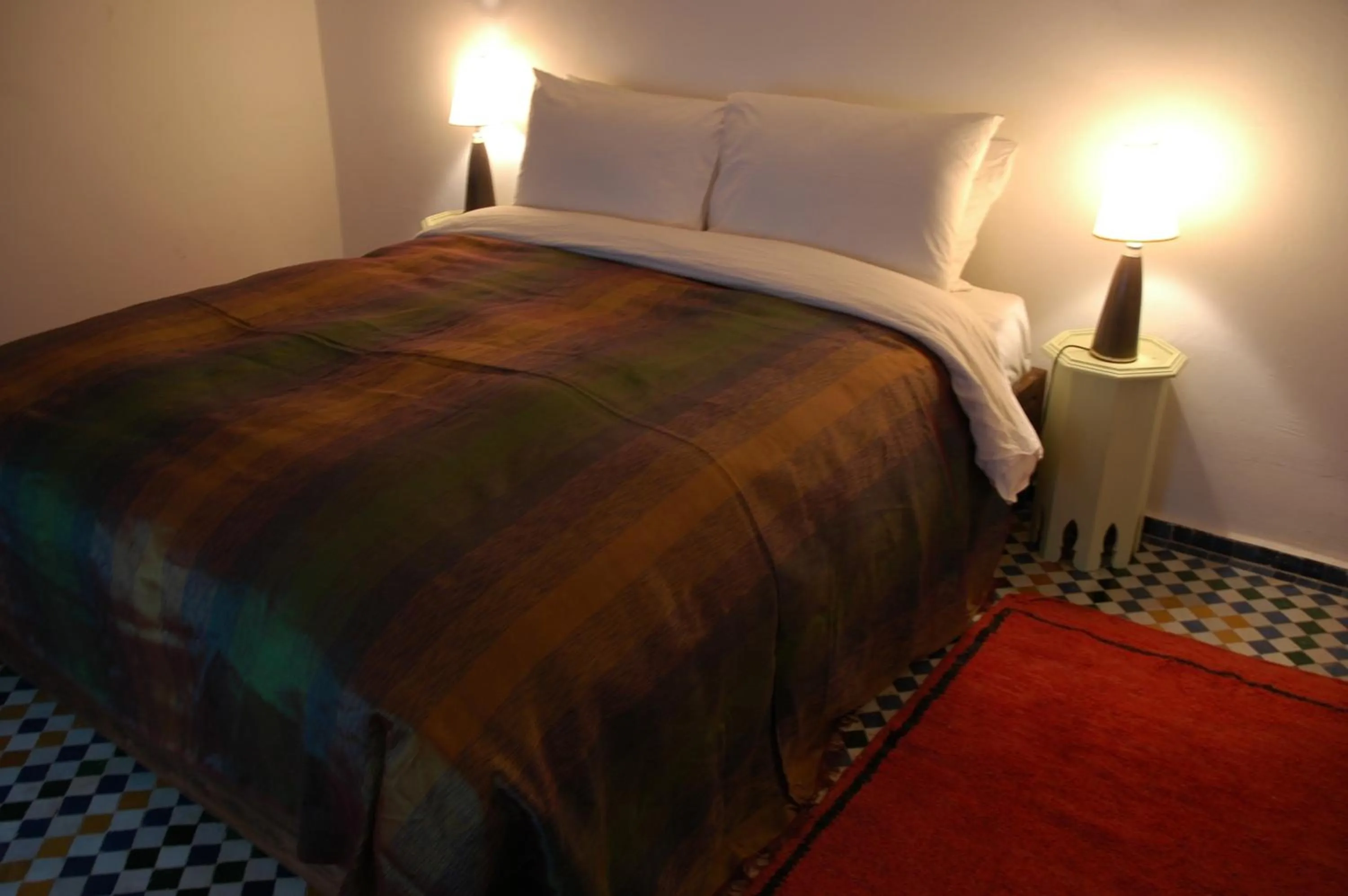 Bed in Riad Tizwa Fes