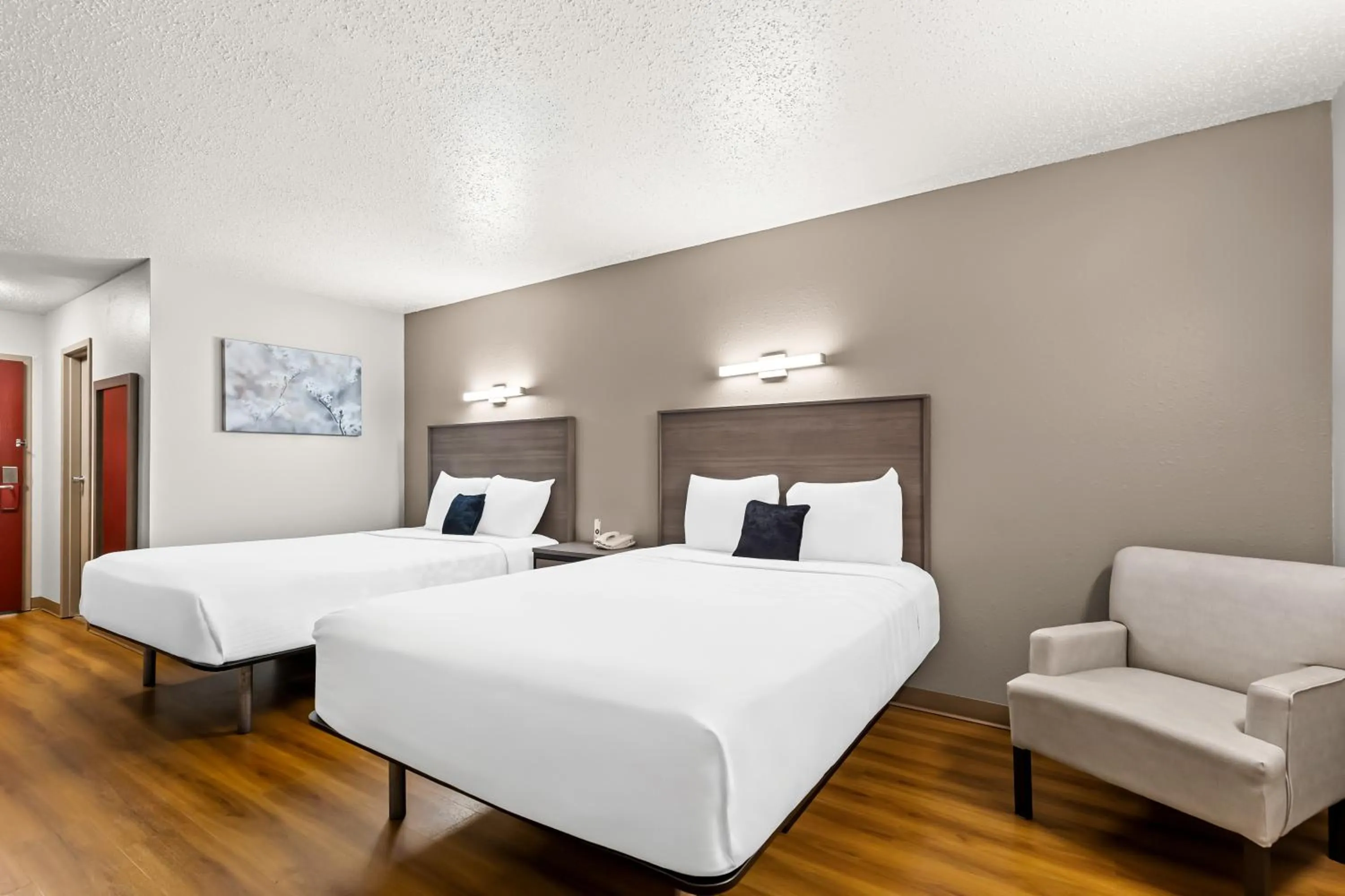 Bed in Red Lion Inn & Suites Saint Louis