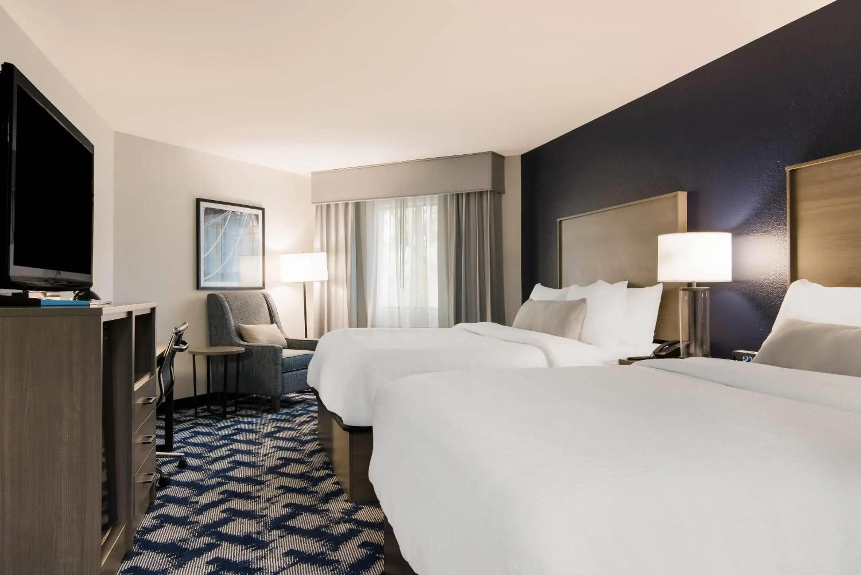 Bedroom, Bed in The Inn on Maritime Bay, an Ascend Collection Hotel Bedroom, Bed in The Inn on Maritime Bay, an Ascend Collection Hotel