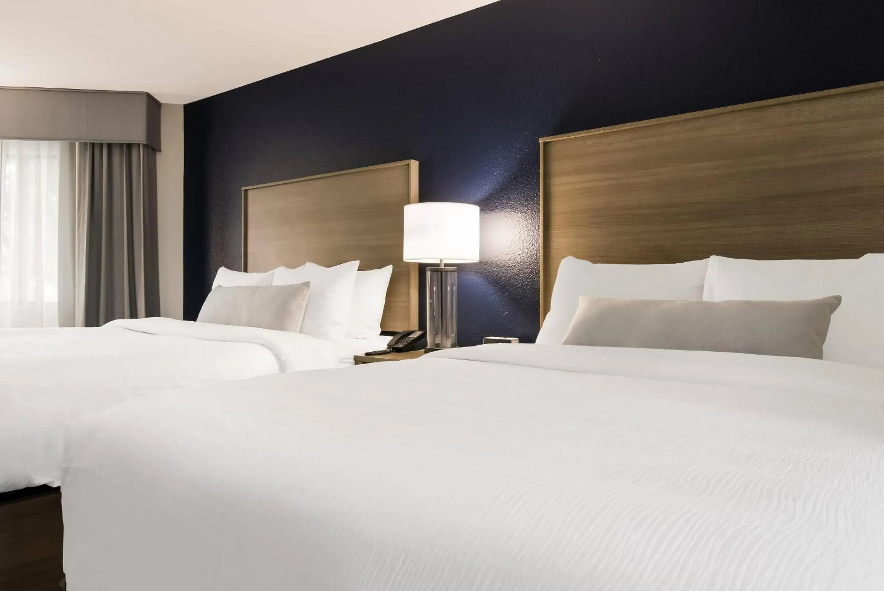 Bedroom, Bed in The Inn on Maritime Bay, an Ascend Collection Hotel Bedroom, Bed in The Inn on Maritime Bay, an Ascend Collection Hotel