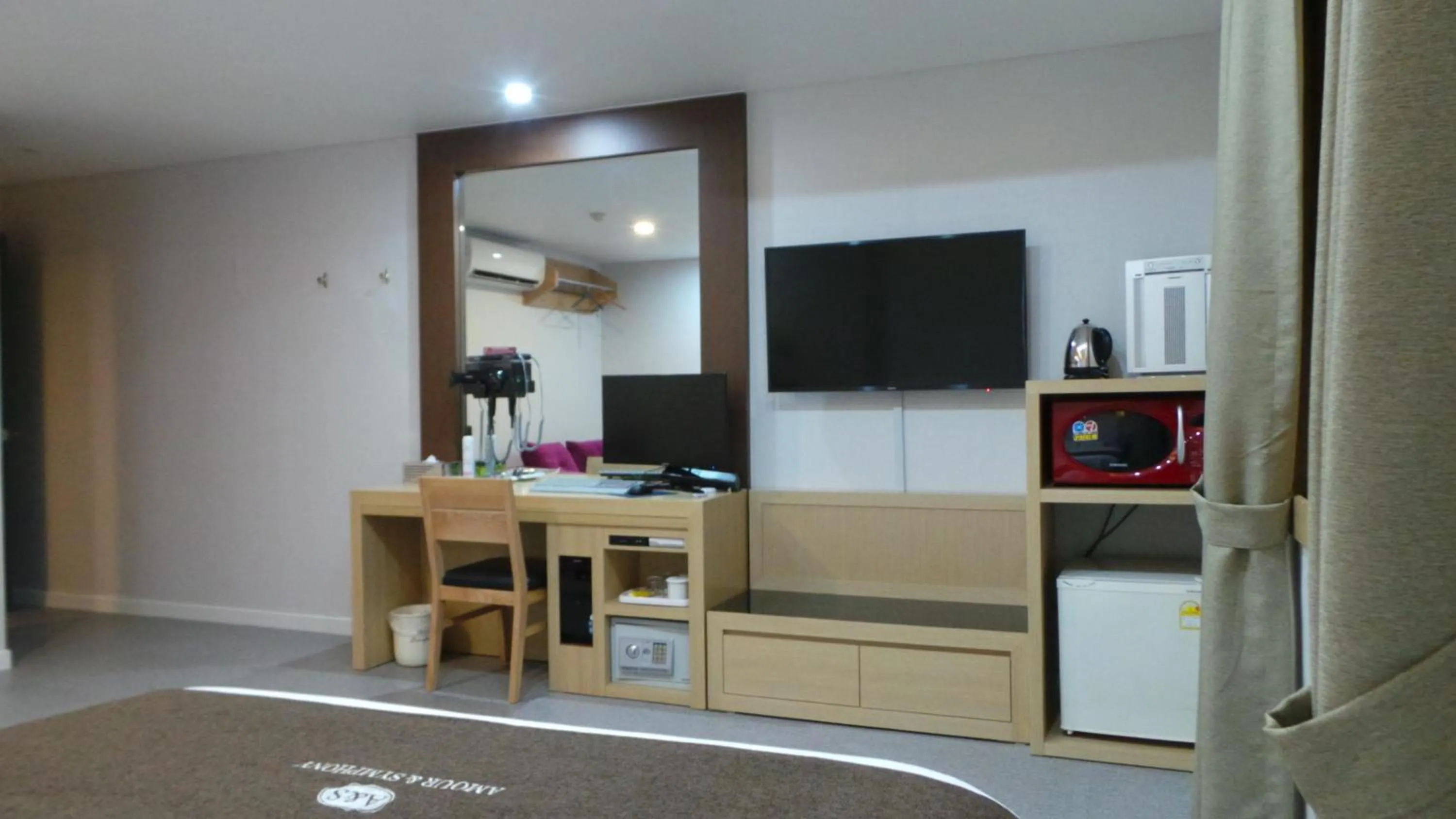 Bed in Symphony Hotel