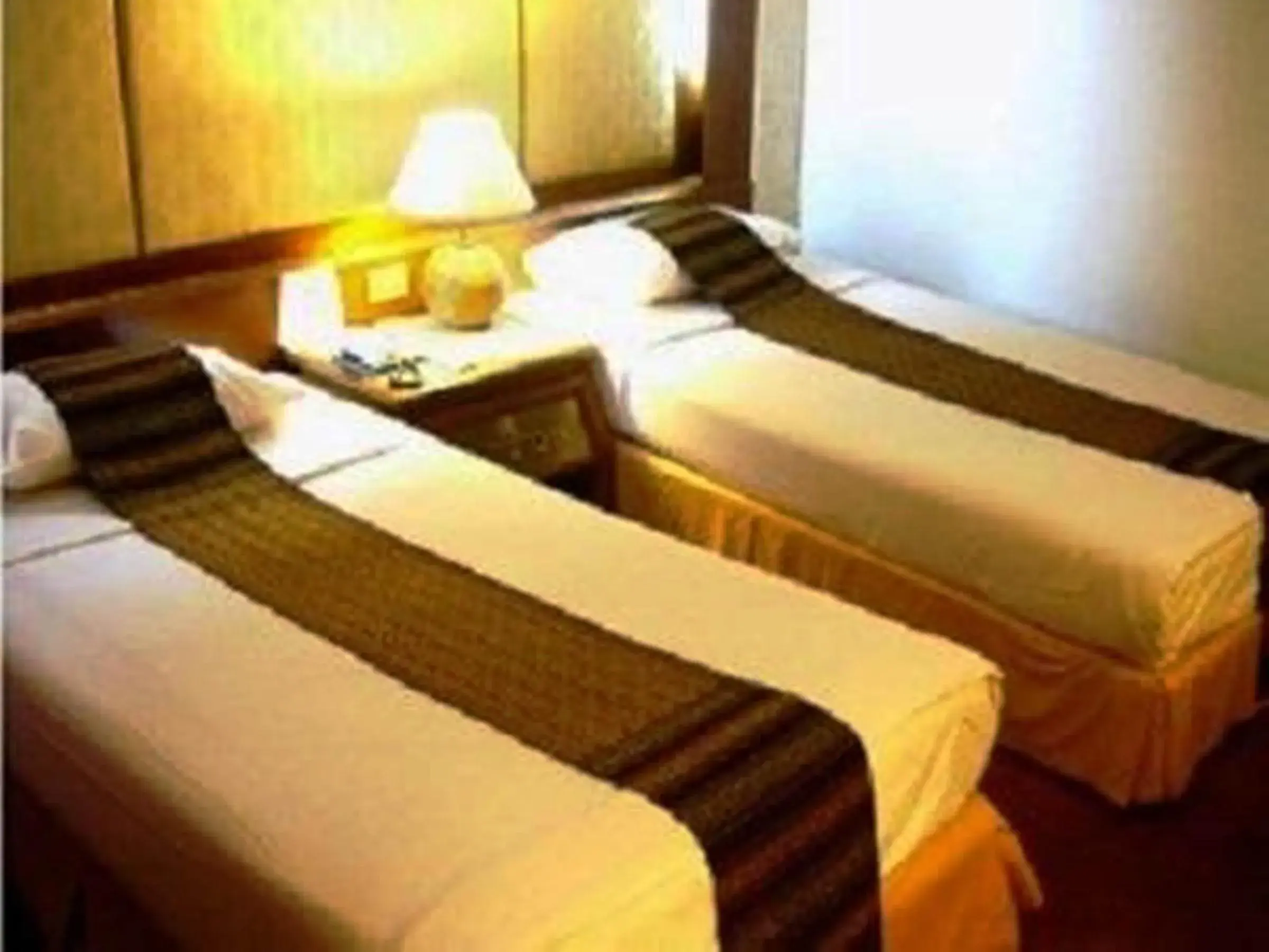 Bedroom in The Regency Hotel Hatyai Bedroom in The Regency Hotel Hatyai