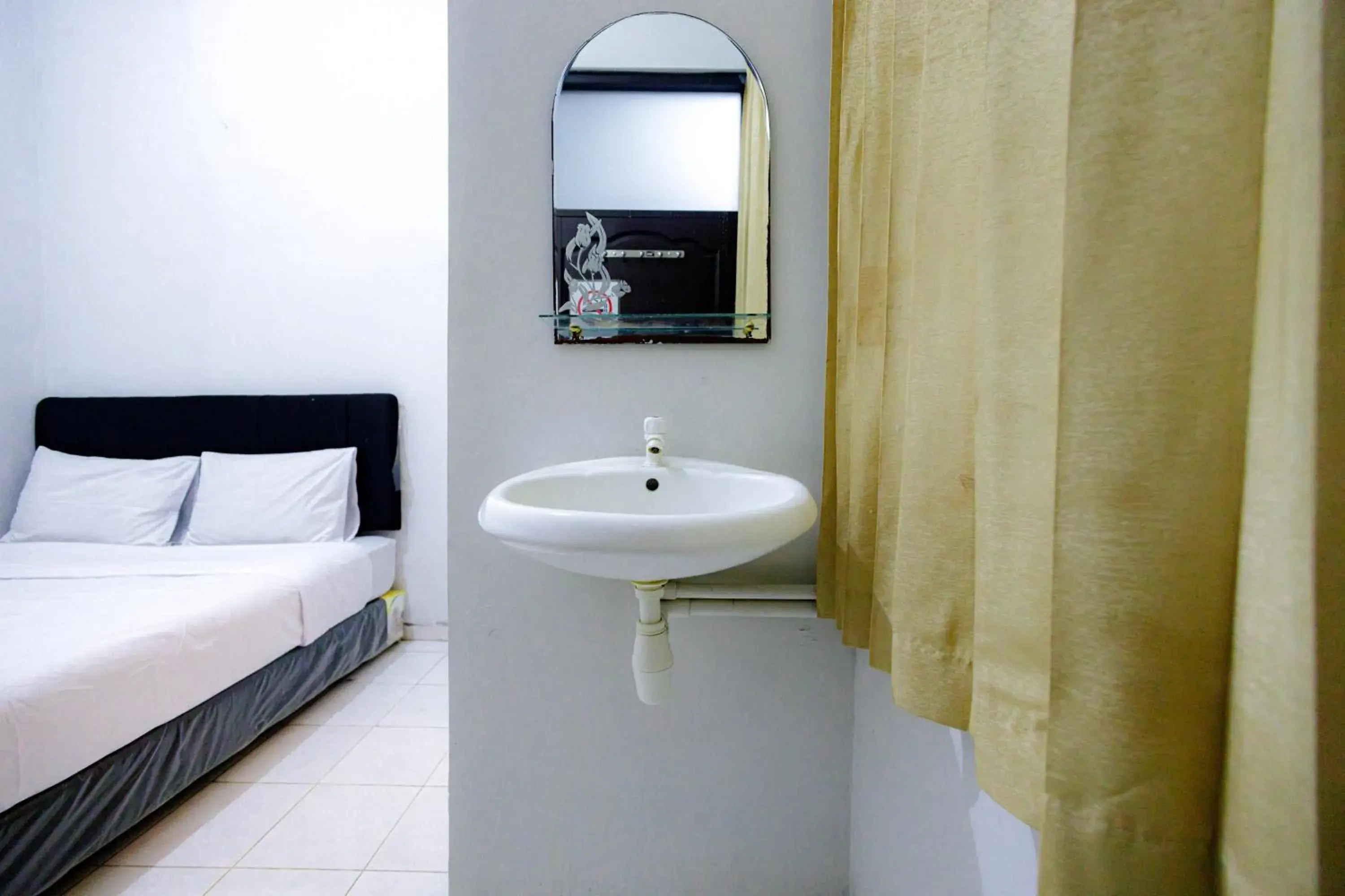 Bed, Bathroom in Marcello Residence Siwalankerto near Petra University Surabaya