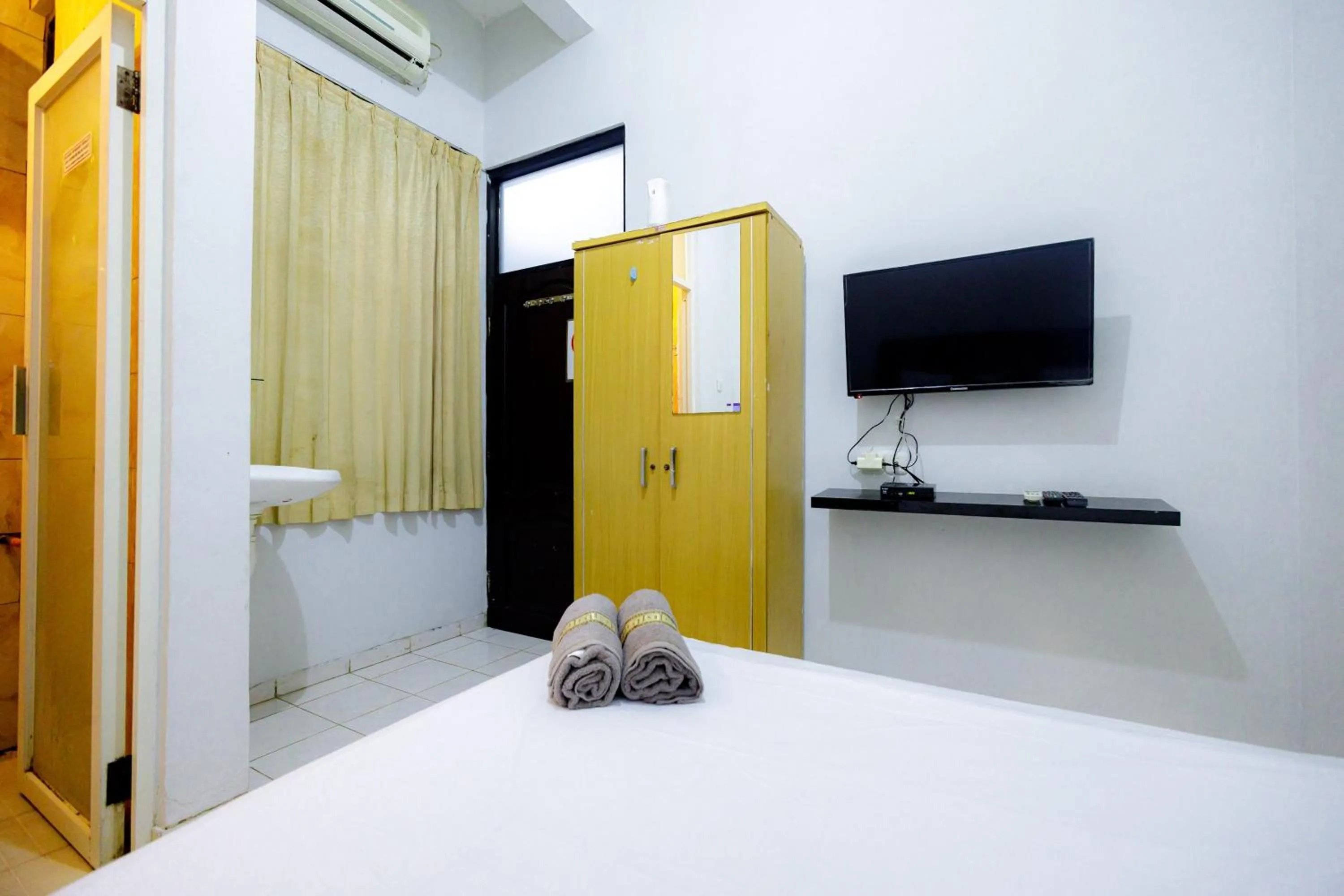 Bed in Marcello Residence Siwalankerto near Petra University Surabaya Mitra RedDoorz