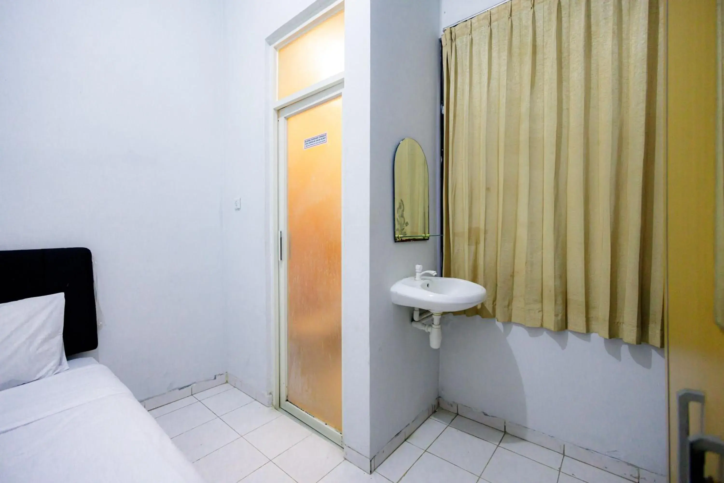 Bed, Bathroom in Marcello Residence Siwalankerto near Petra University Surabaya