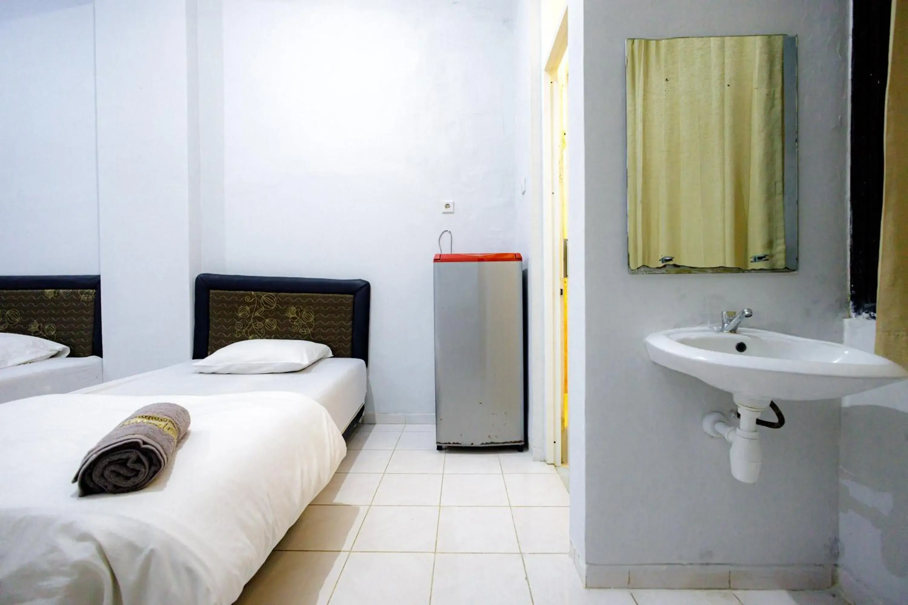 Bed, Bathroom in Marcello Residence Siwalankerto near Petra University Surabaya