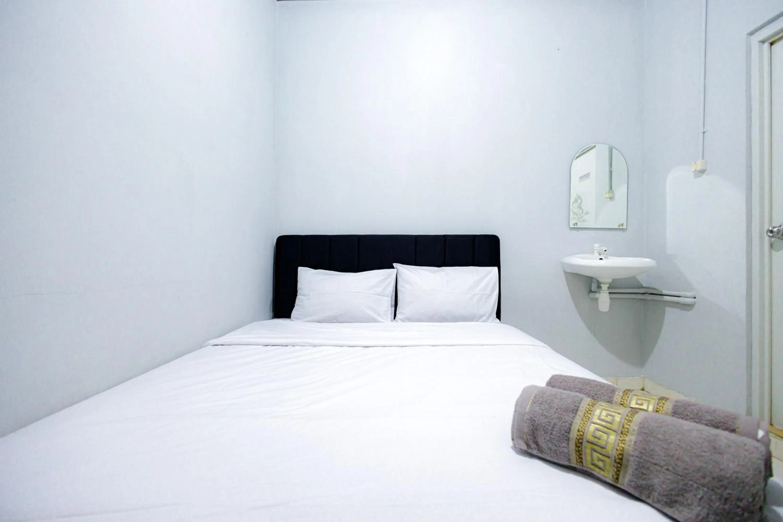 Bed in Marcello Residence Siwalankerto near Petra University Surabaya Mitra RedDoorz