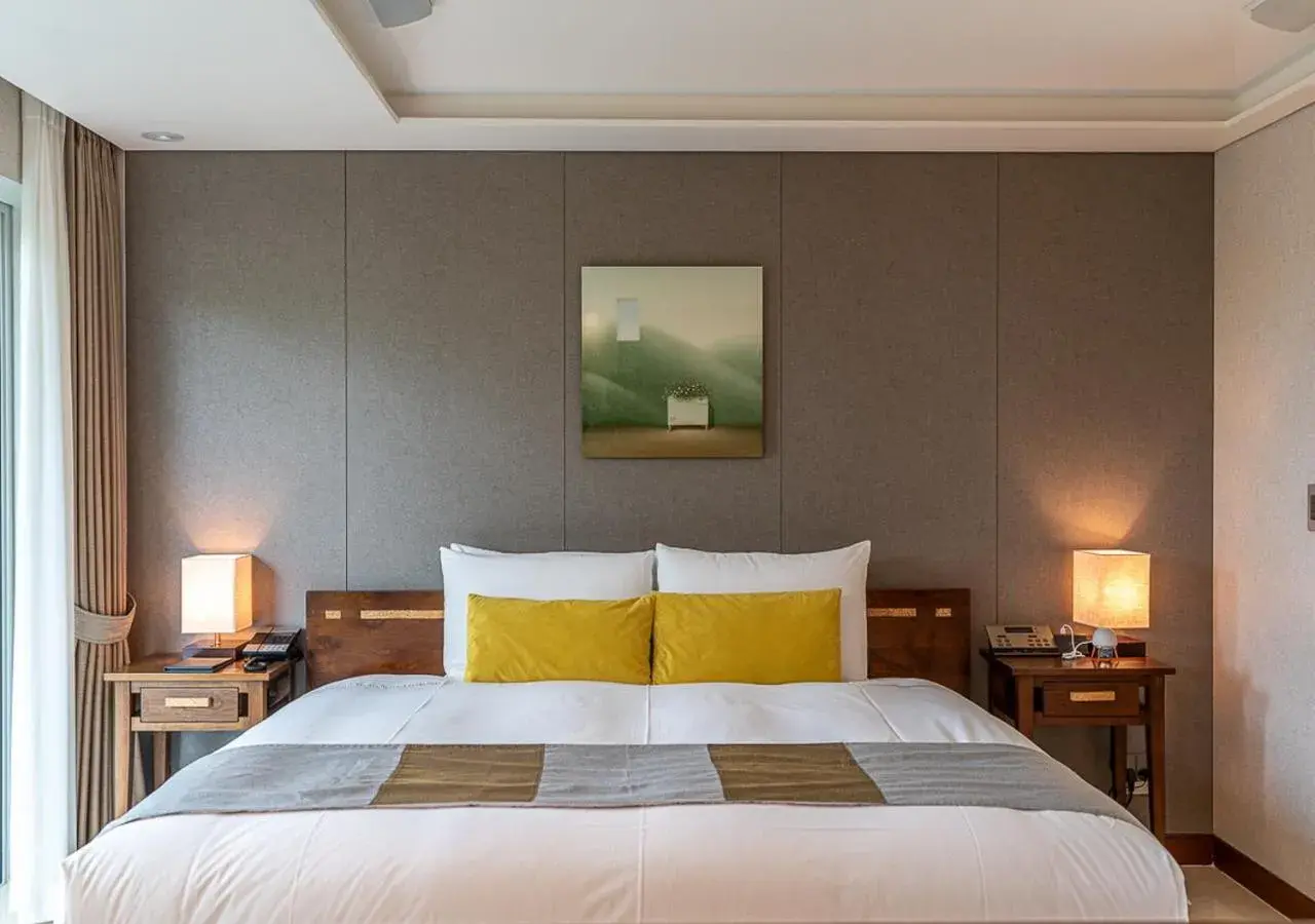 Bed in The Seaes Hotel & Resort Bed in The Seaes Hotel & Resort