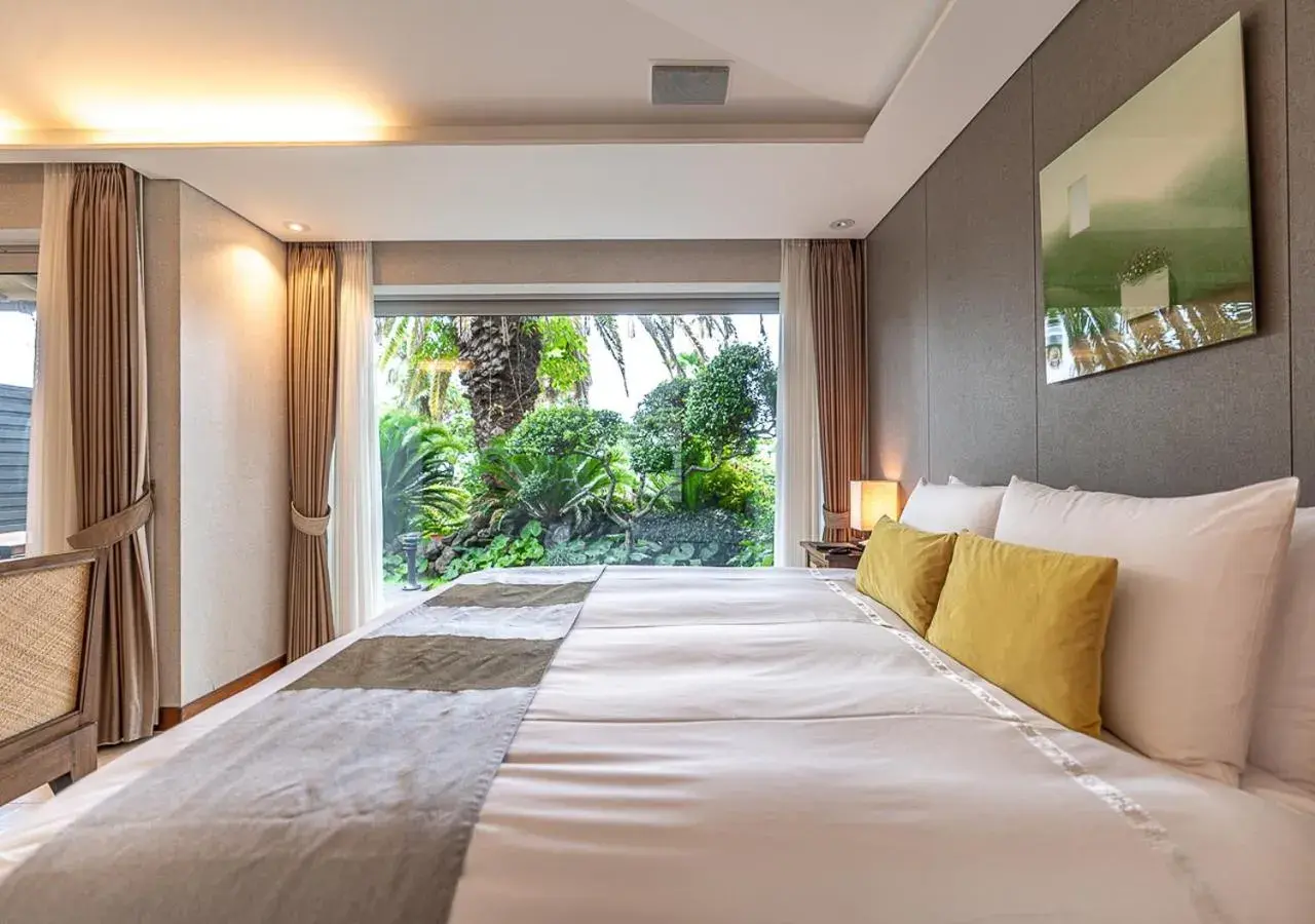 Bed in The Seaes Hotel & Resort Bed in The Seaes Hotel & Resort