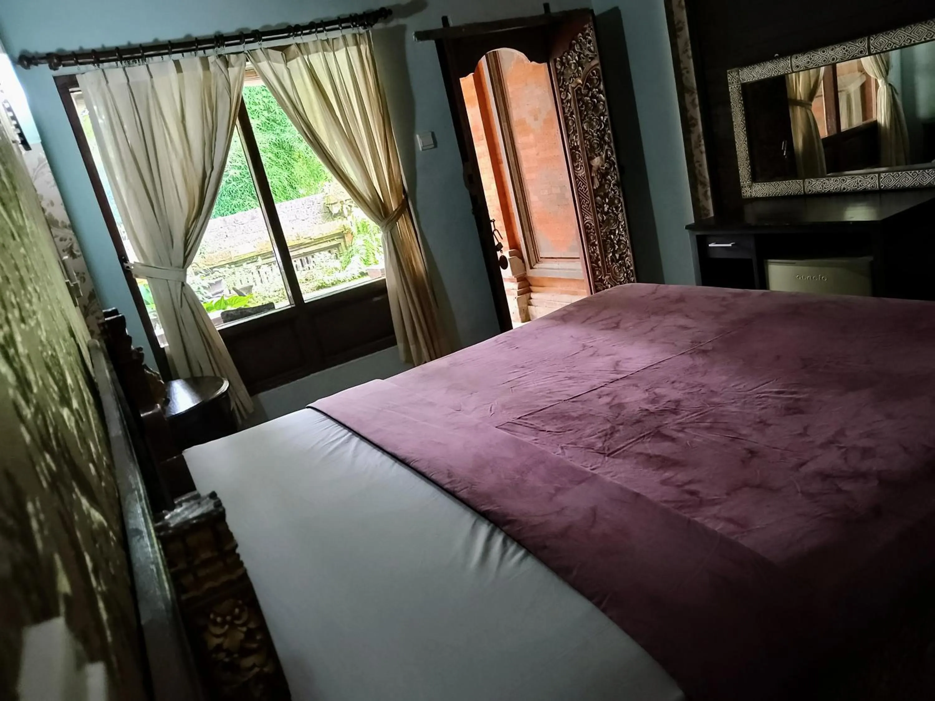Bed in Pering Bungalow Ubud