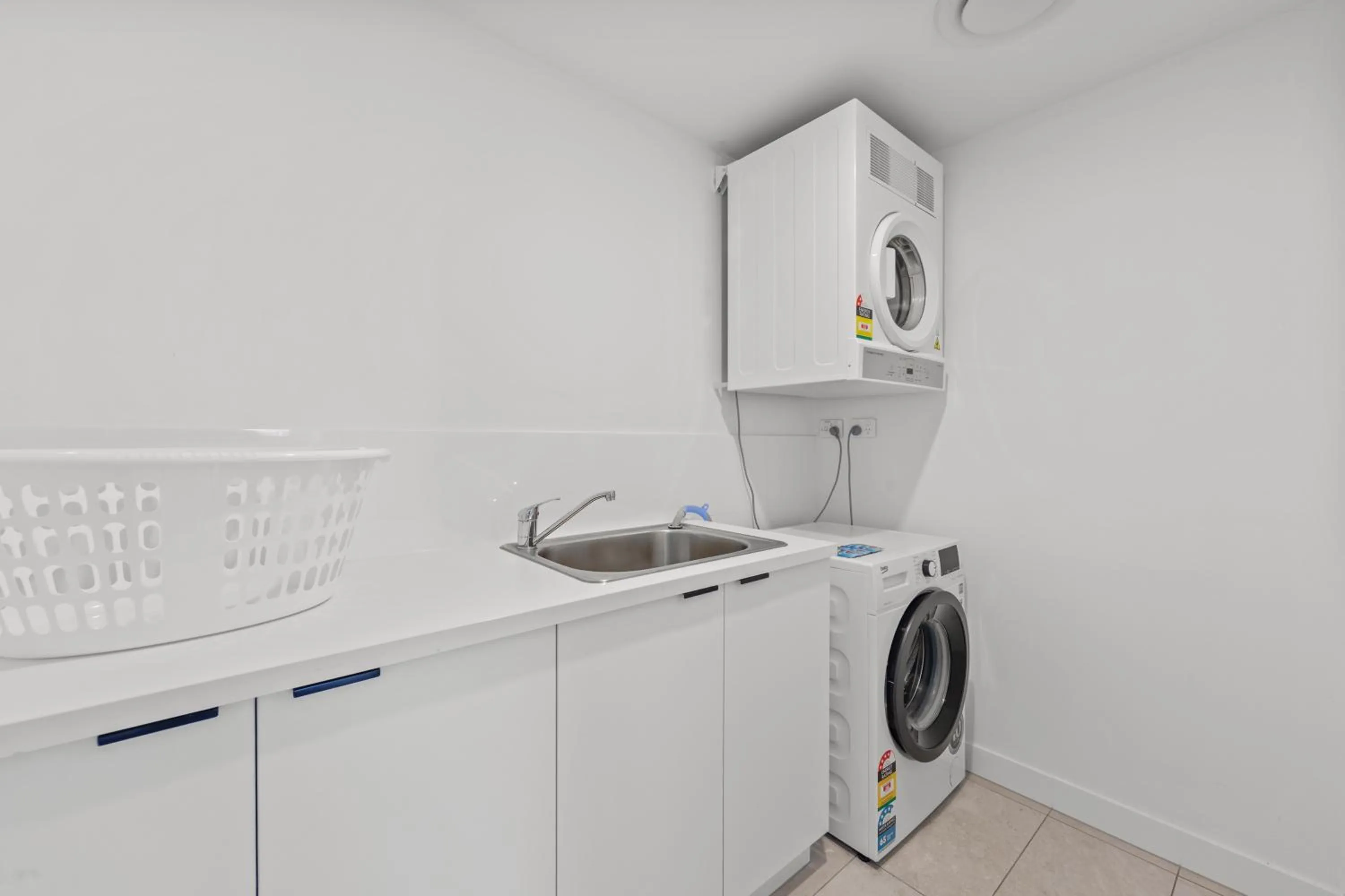 laundry in Brisbane One Apartments by CLLIX