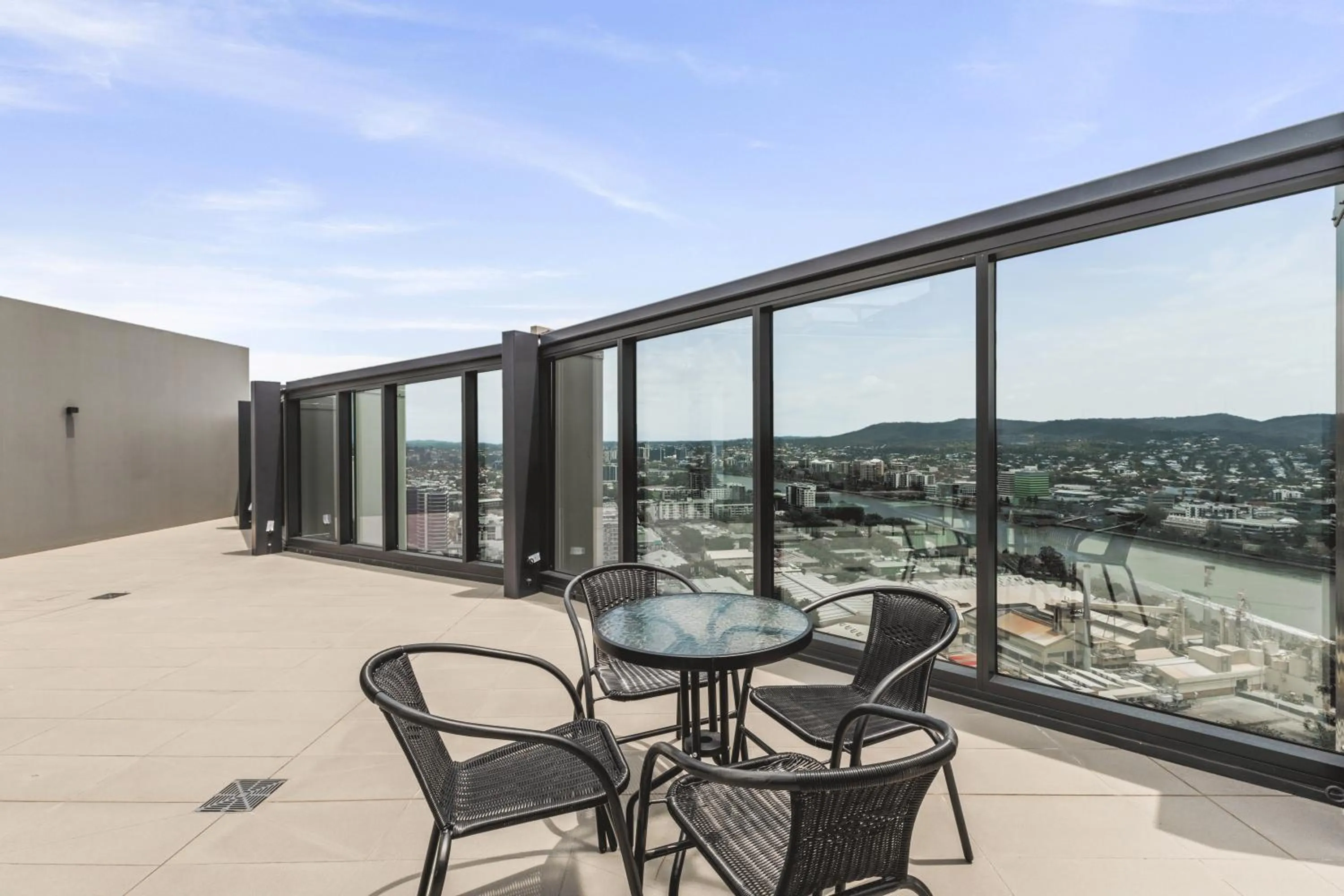 Balcony/Terrace in Brisbane One Apartments by CLLIX