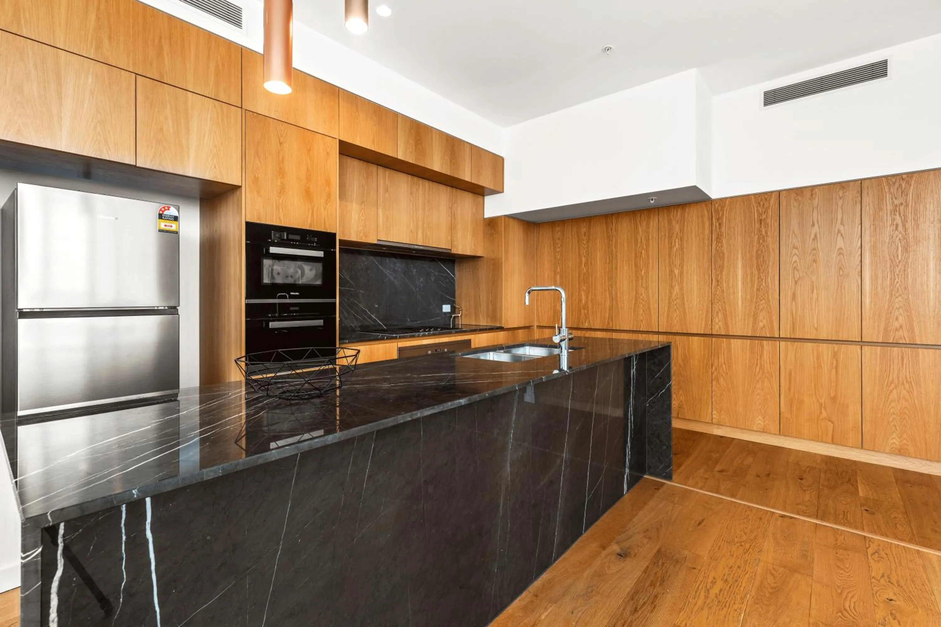 Kitchen or kitchenette in Brisbane One Apartments by CLLIX