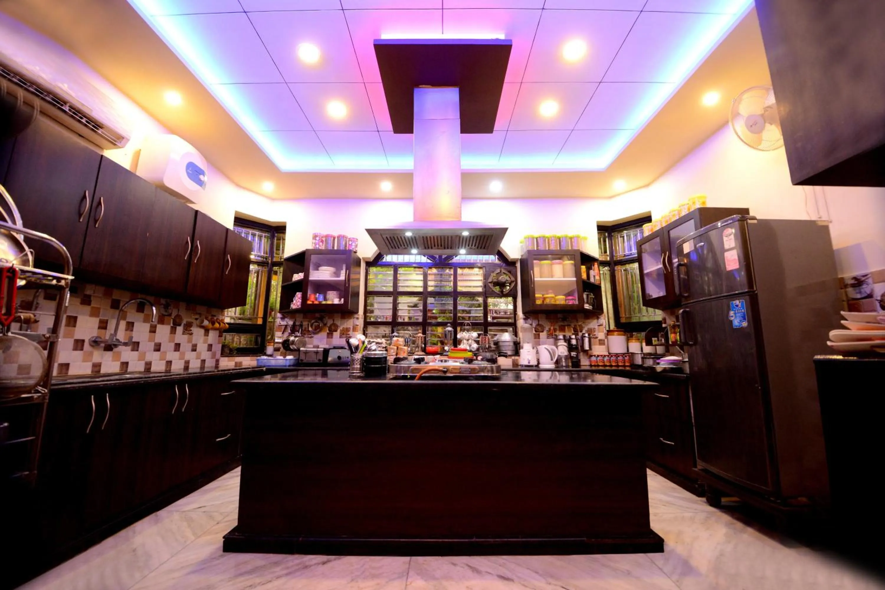 Communal kitchen in Aman Homestay, A Boutique Hotel