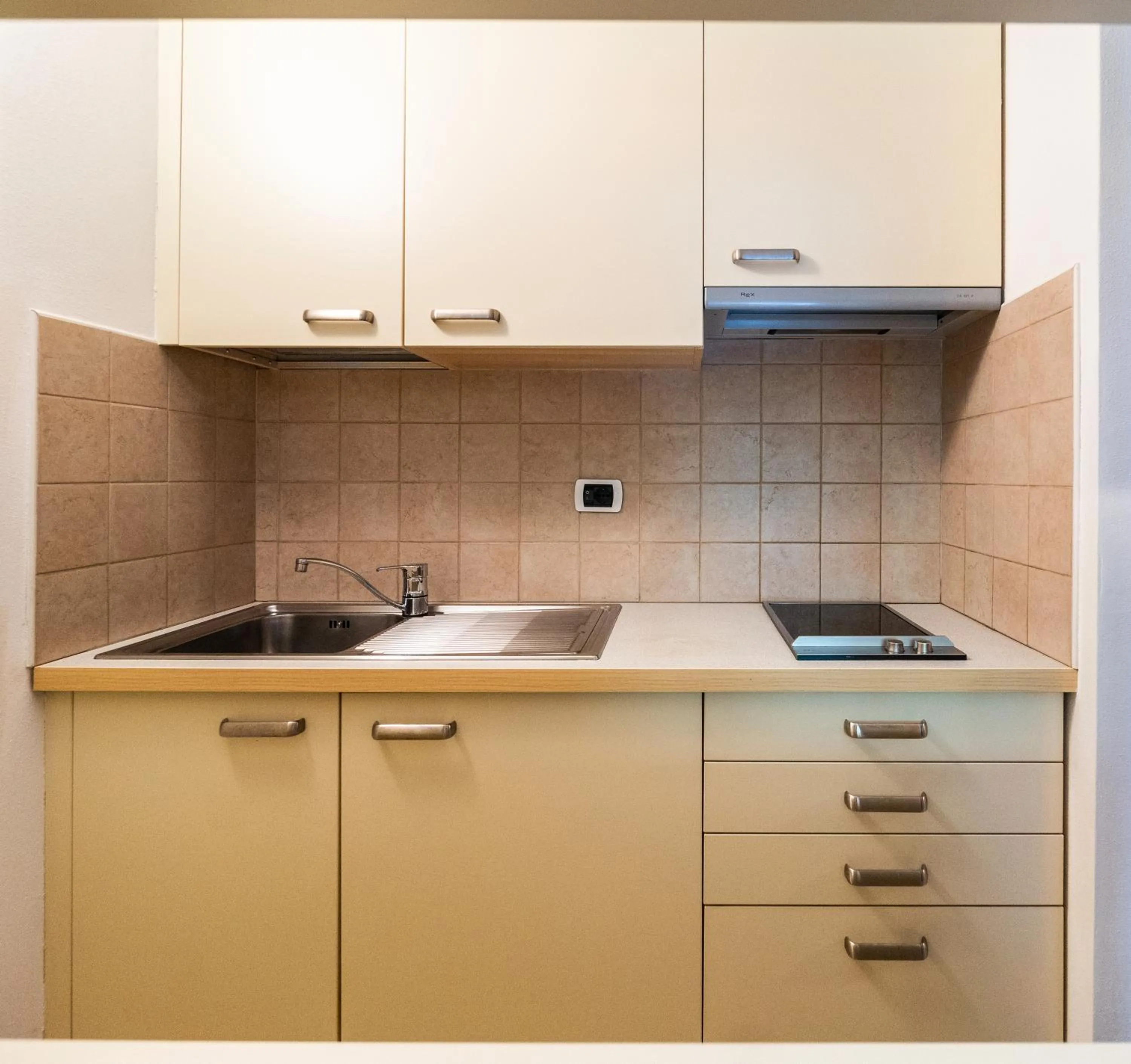 Kitchen or kitchenette in Ambiez Residencehotel