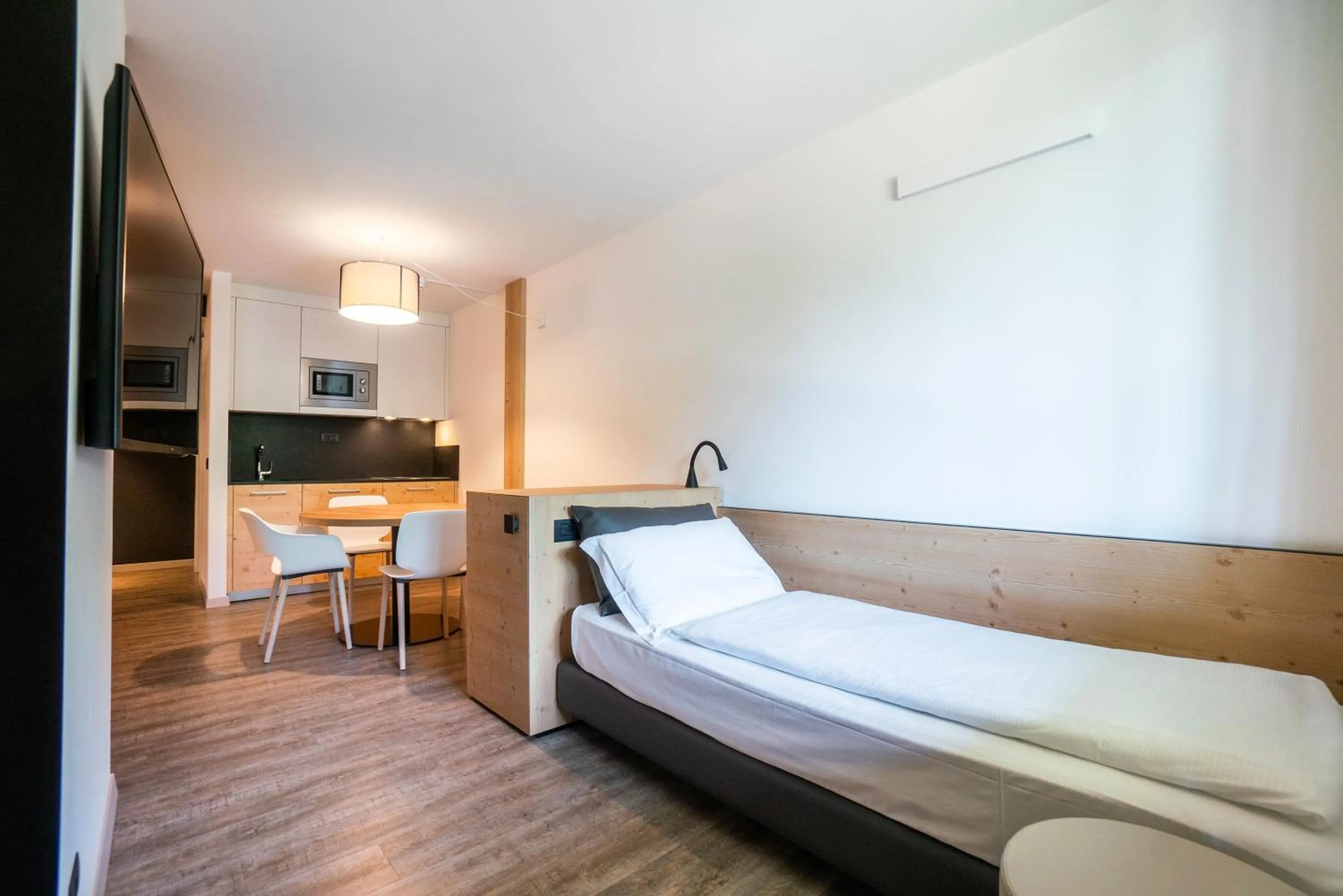 Living room, Bed in Ambiez Residencehotel