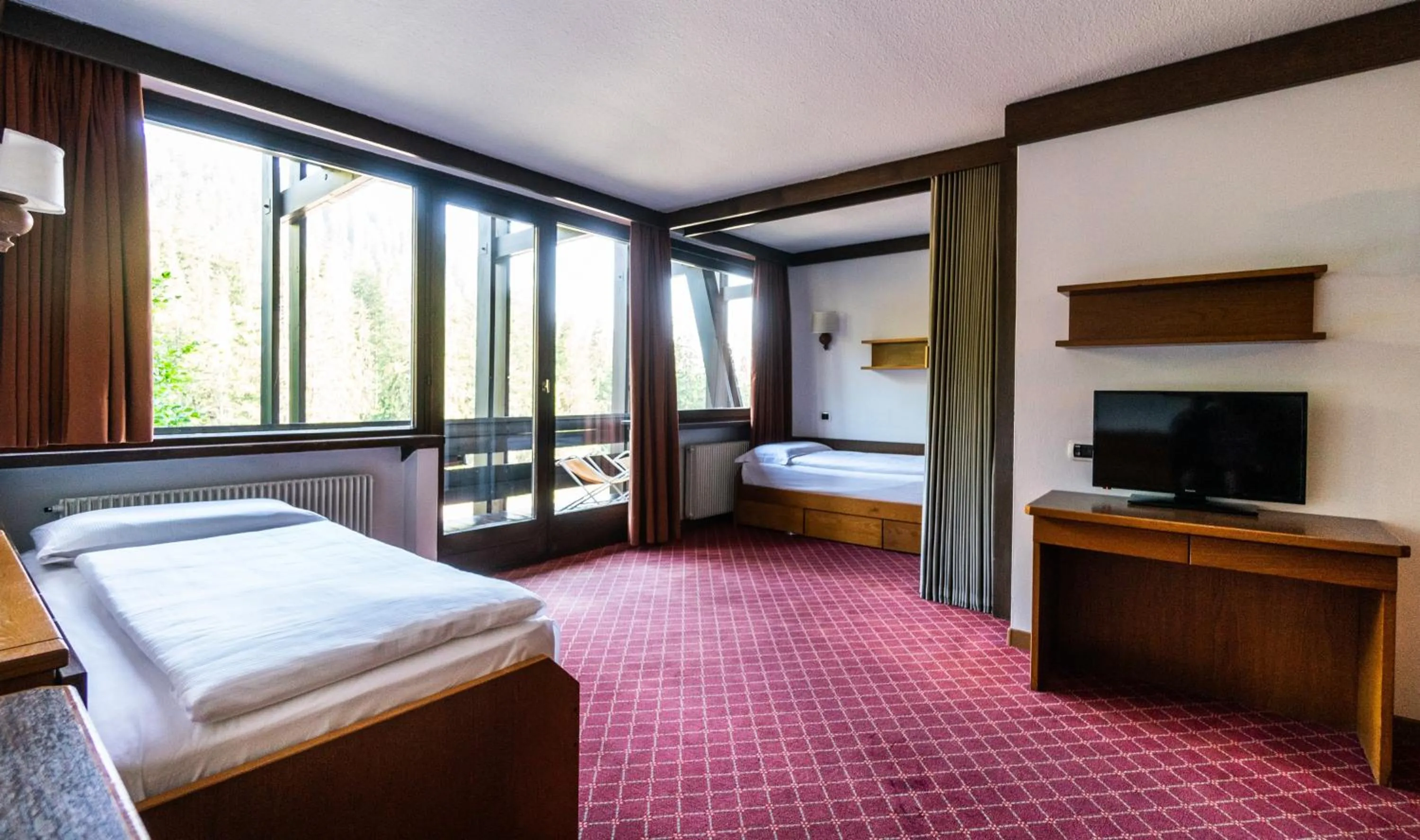 Bed in Ambiez Residencehotel