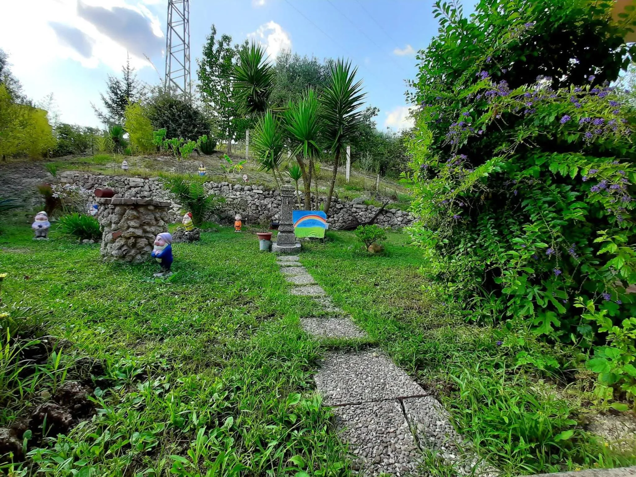 Garden in B&b Villa Santa Sofia by holidayngo