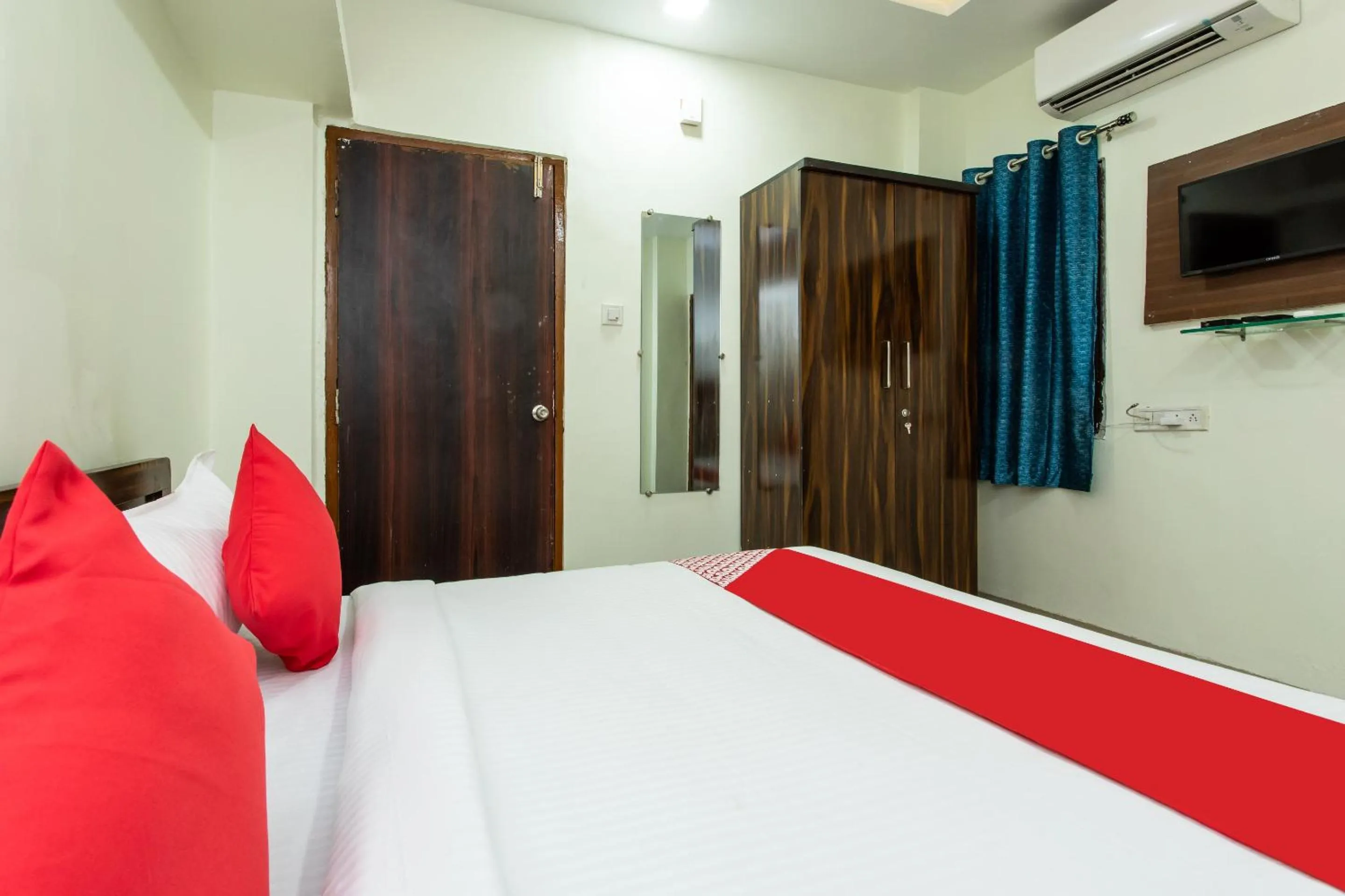 Bedroom in Hotel O Manjulam Regency