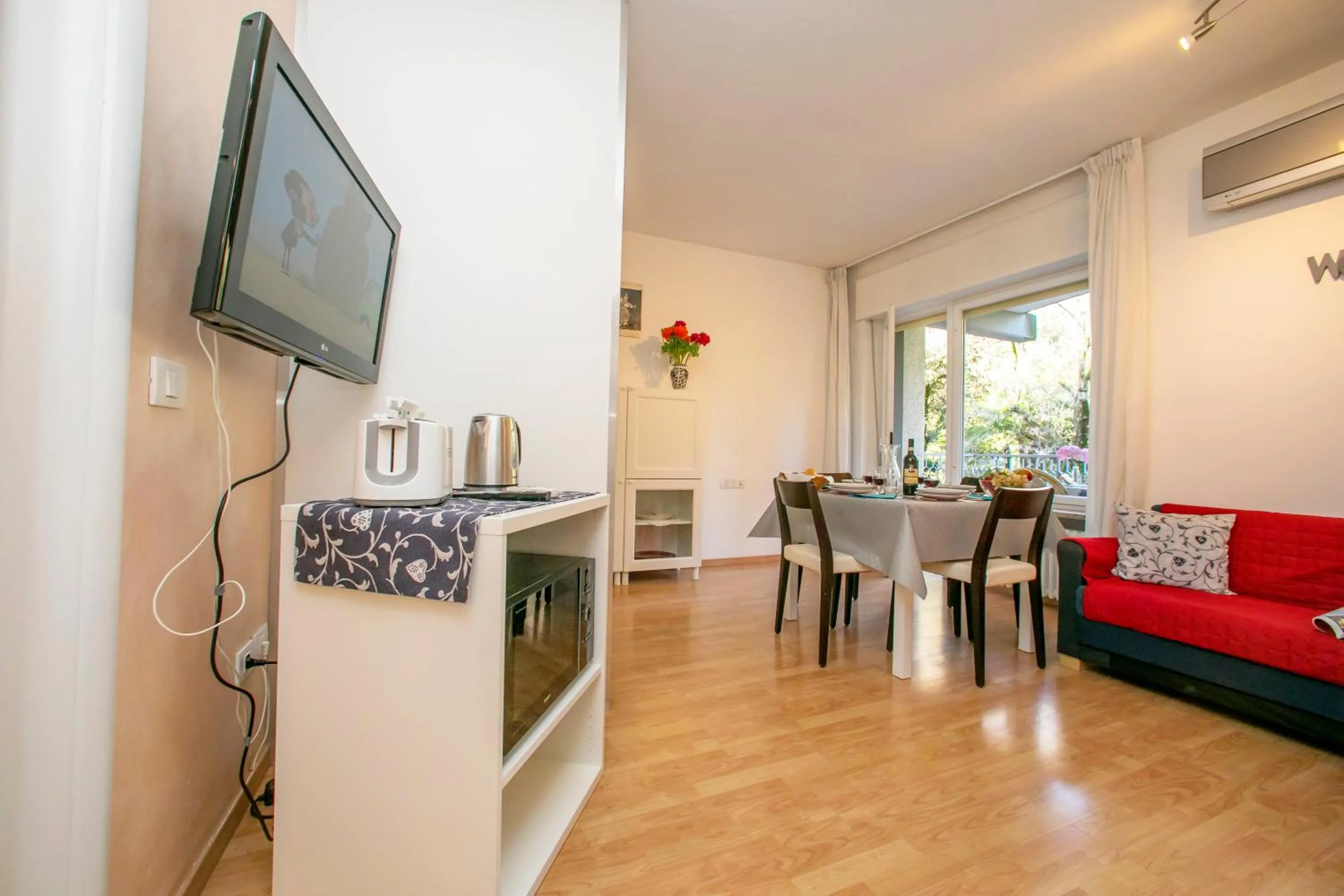 Living room in Riva Lago e Spiaggia Apartment - Happy Rentals