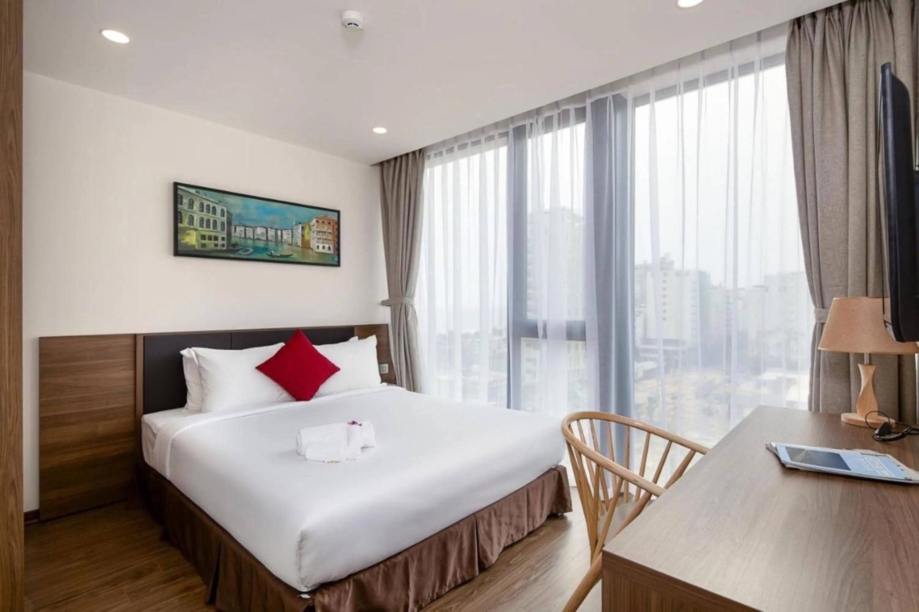 Bed in Amunra Ocean Hotel