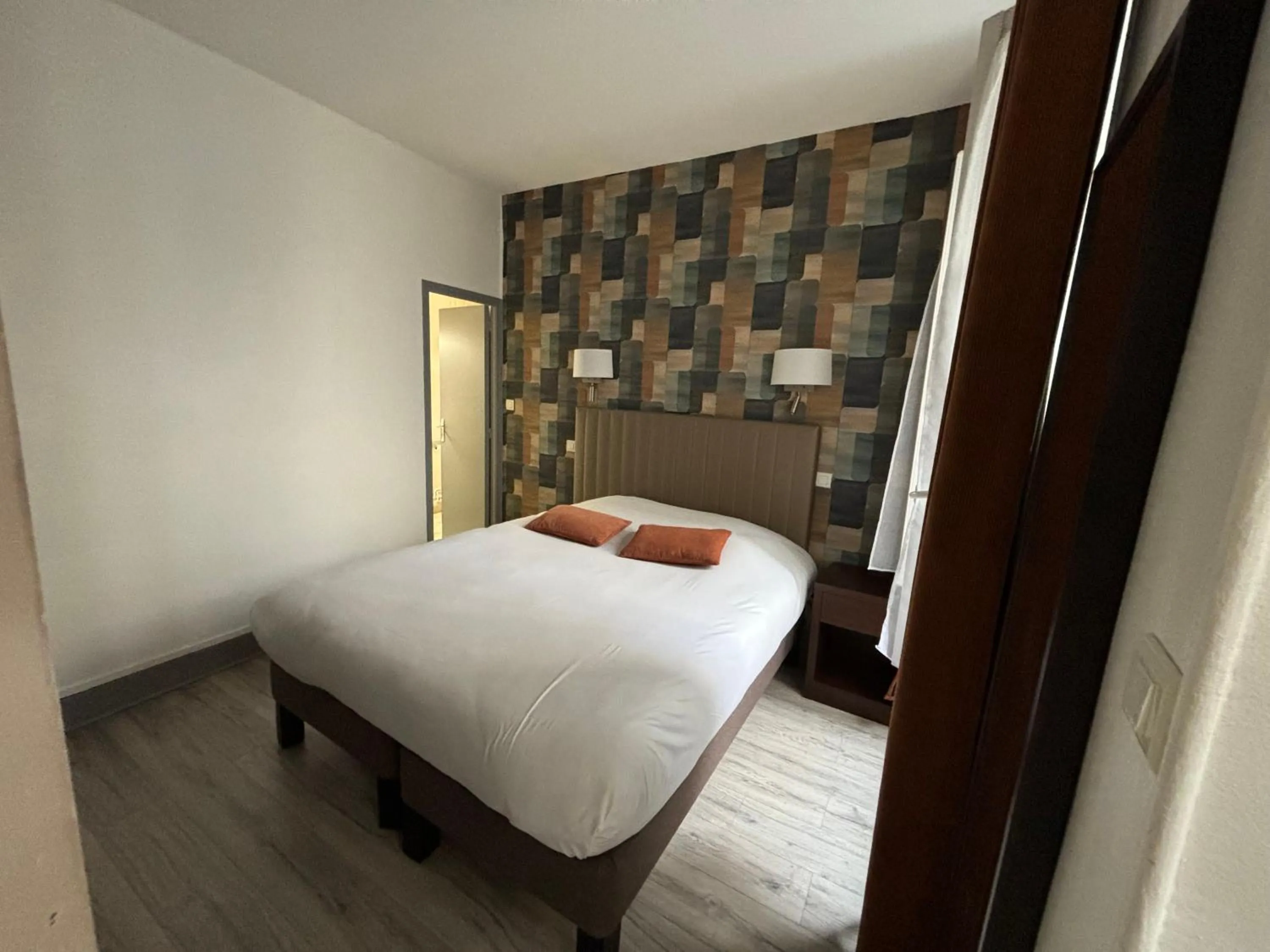 Bed in Hotel Le Jacquemart