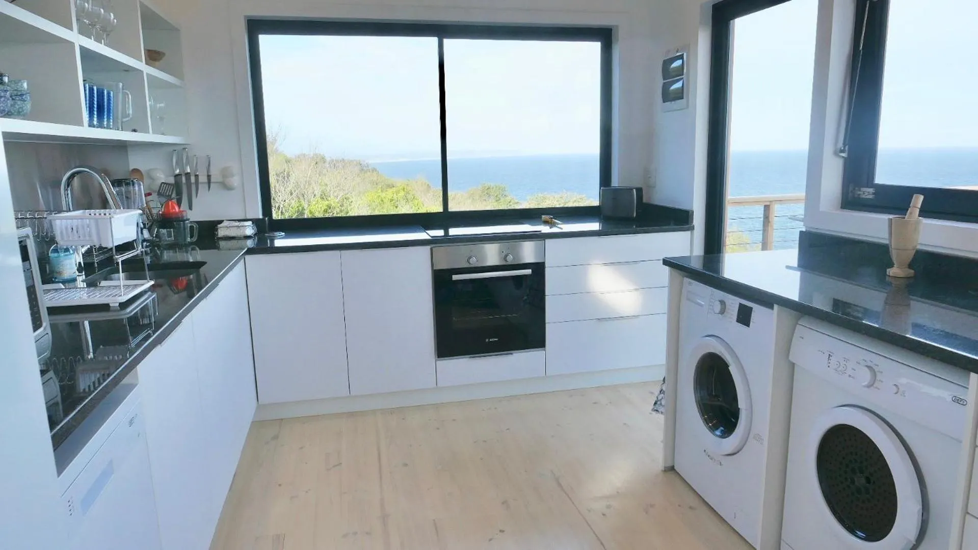 Kitchen or kitchenette in Earth Wind and Ocean 33