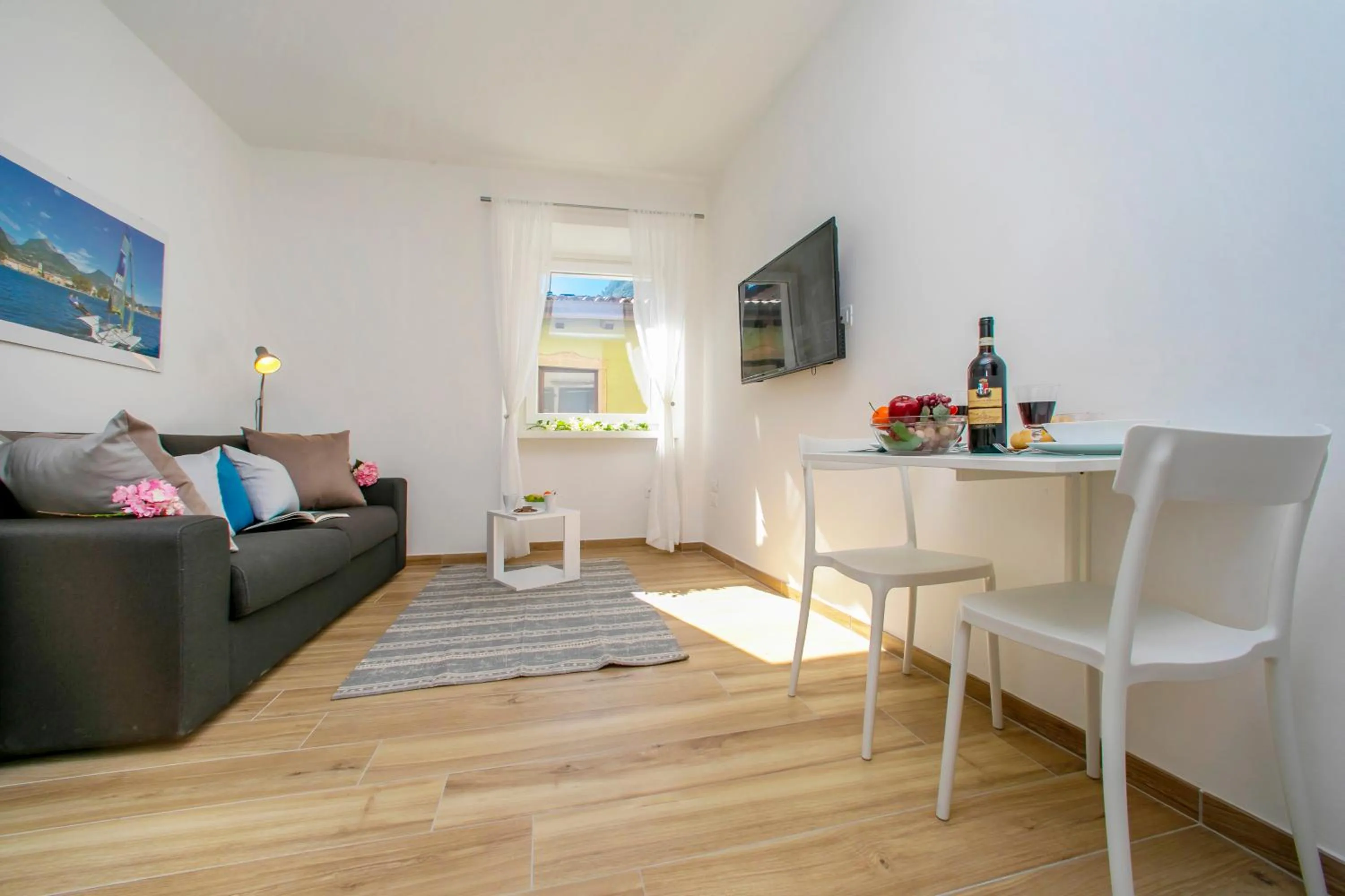 Living room in Nido sui Tetti di Riva del Garda - Happy Rentals