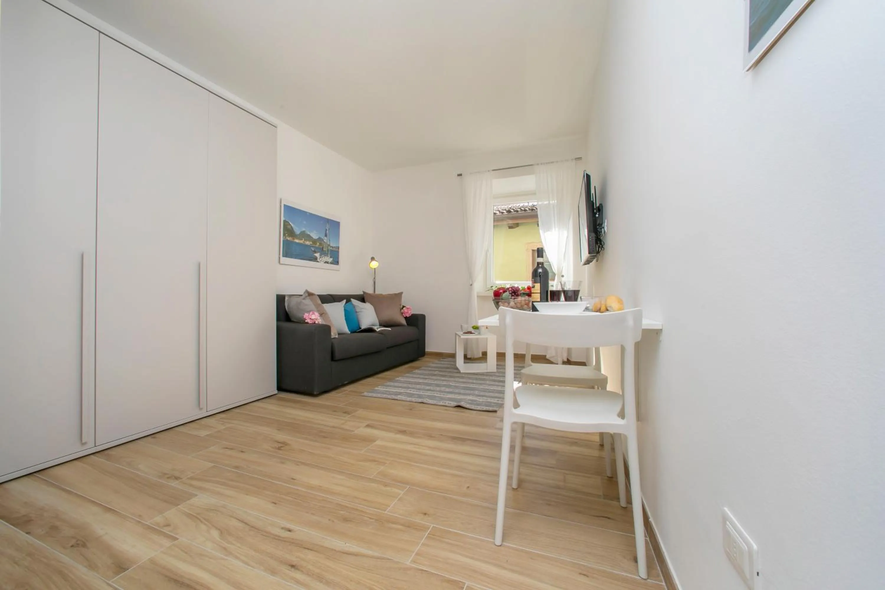 Dining area in Nido sui Tetti di Riva del Garda - Happy Rentals