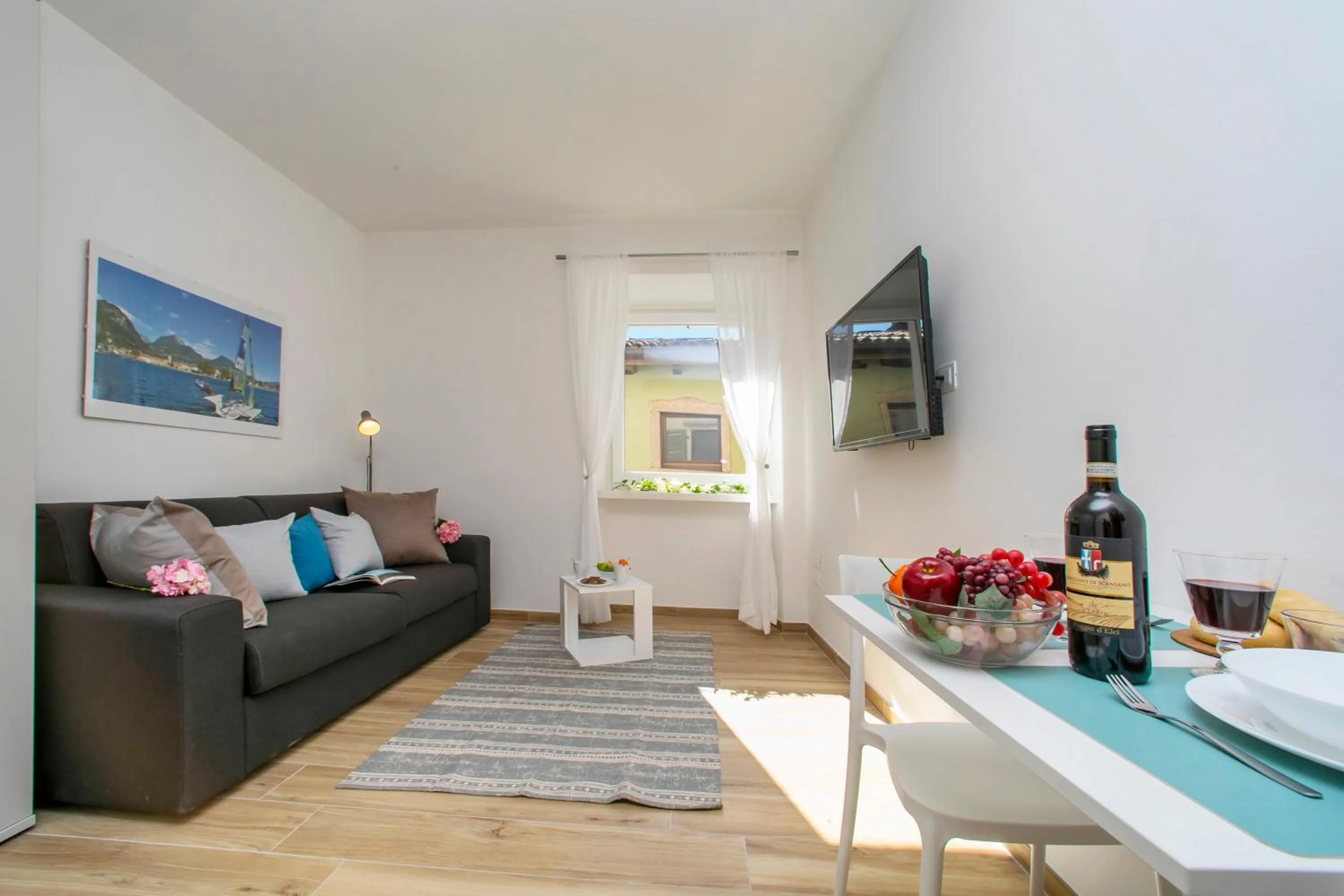 Living room in Nido sui Tetti di Riva del Garda - Happy Rentals