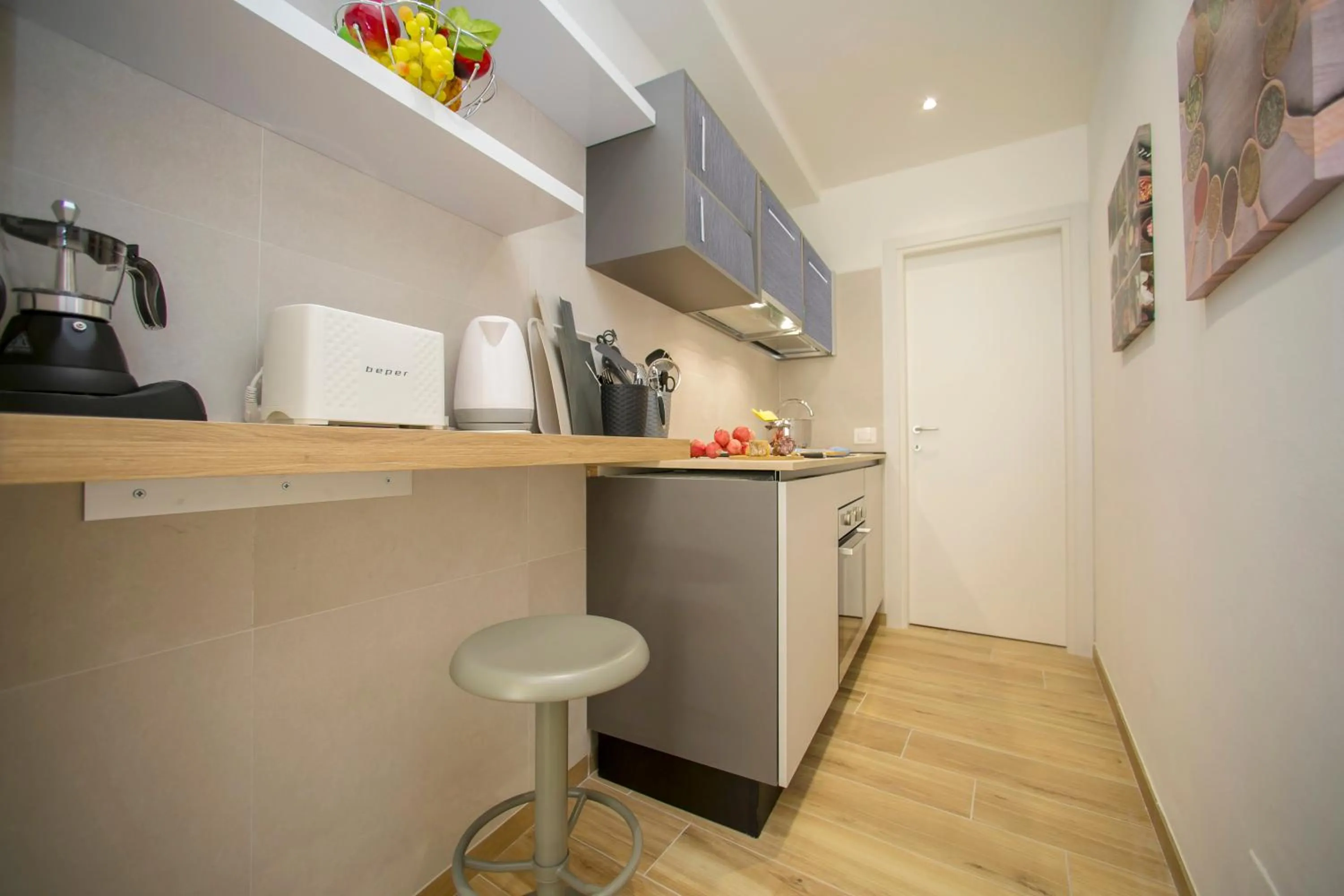 Kitchen or kitchenette in Nido sui Tetti di Riva del Garda - Happy Rentals