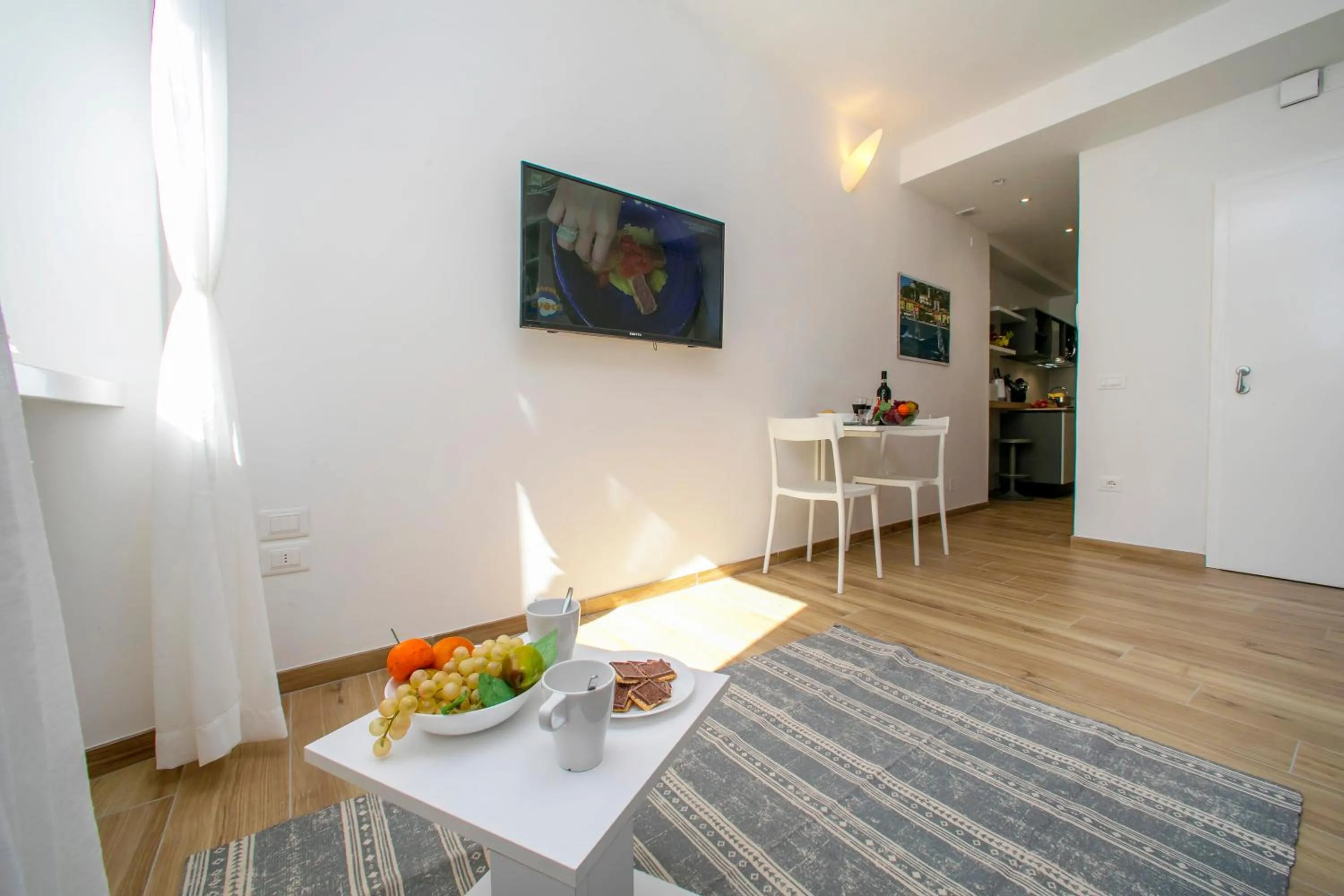 Living room in Nido sui Tetti di Riva del Garda - Happy Rentals