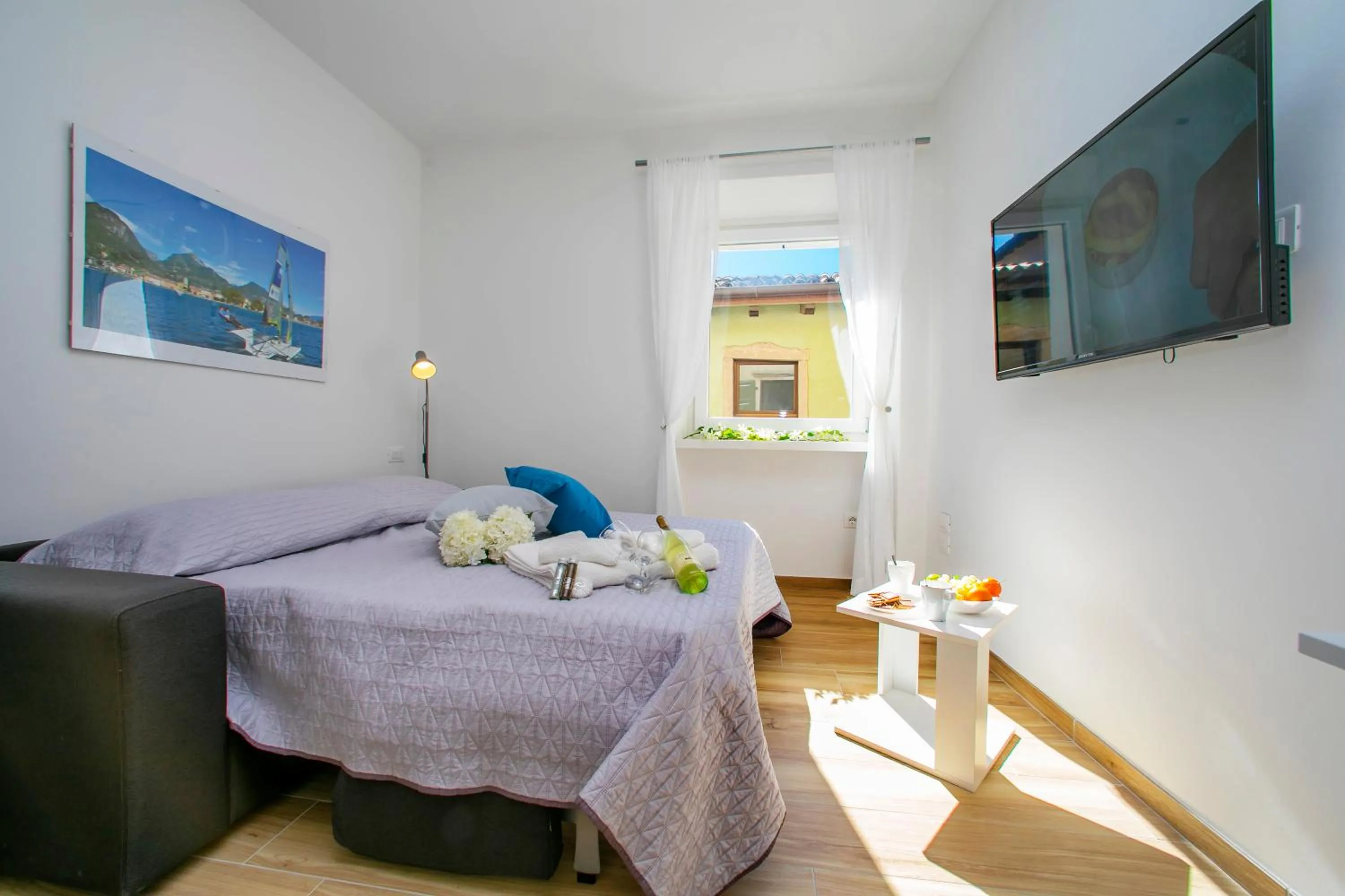 Living room in Nido sui Tetti di Riva del Garda - Happy Rentals