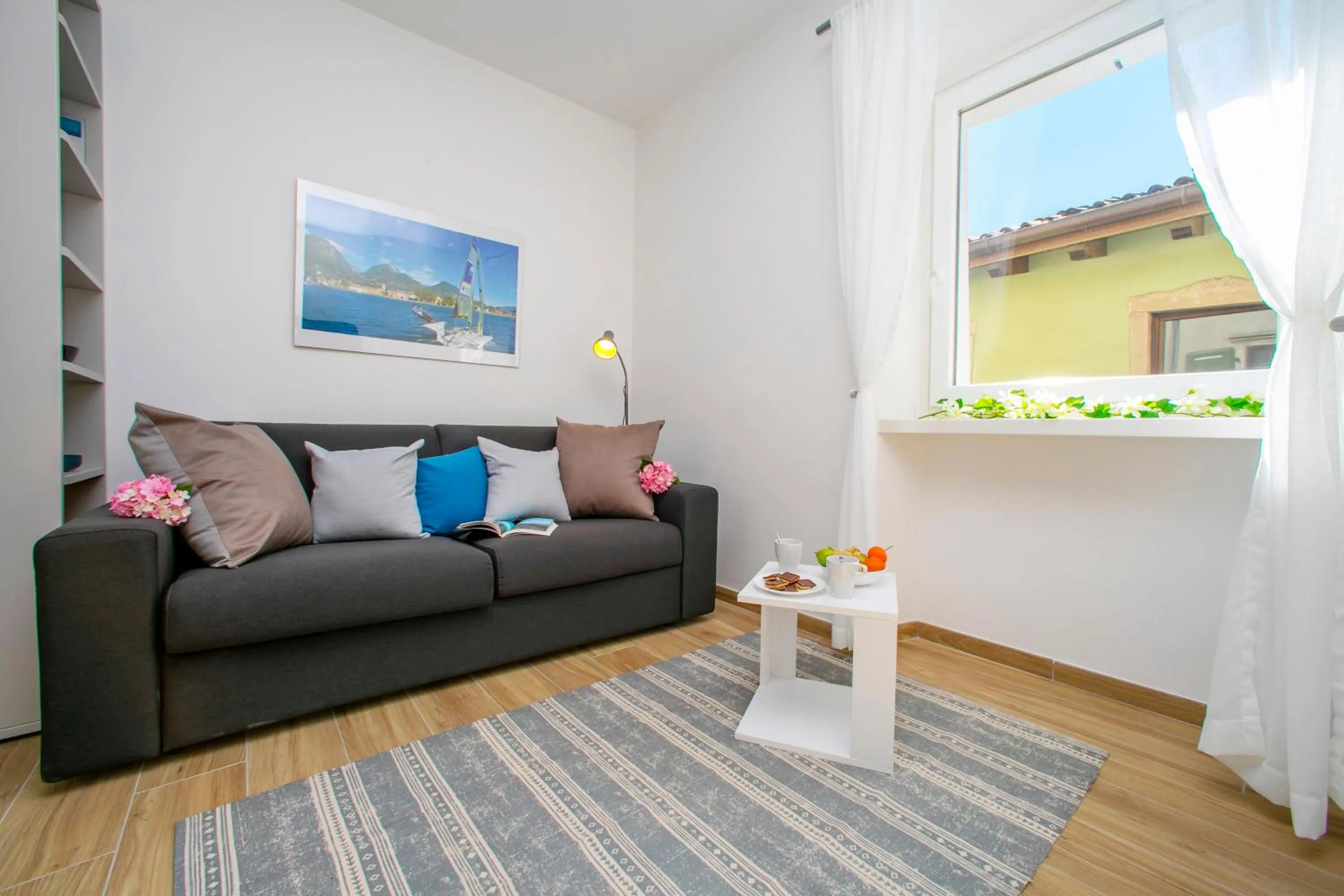 Living room in Nido sui Tetti di Riva del Garda - Happy Rentals