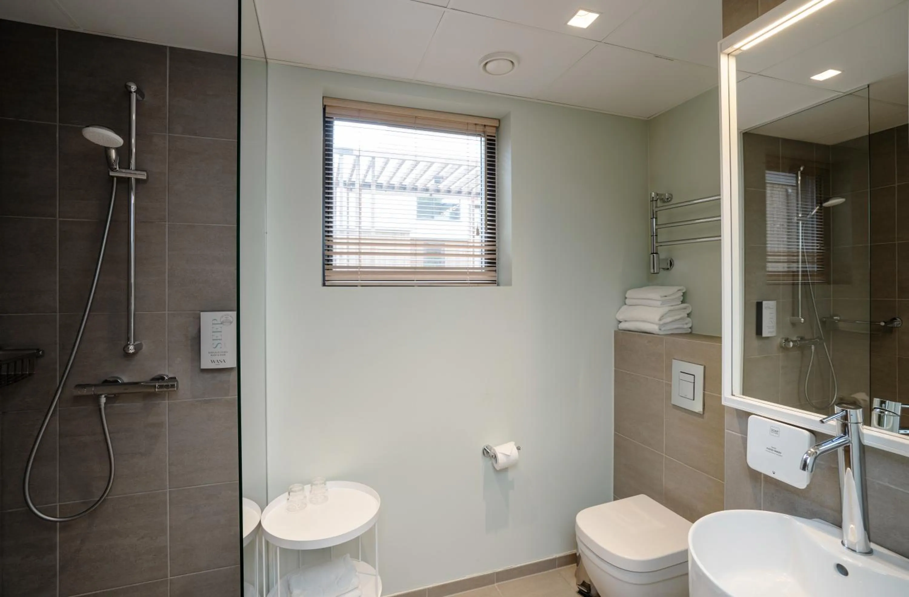 Shower in Wasa Resort Hotel, Apartments & SPA